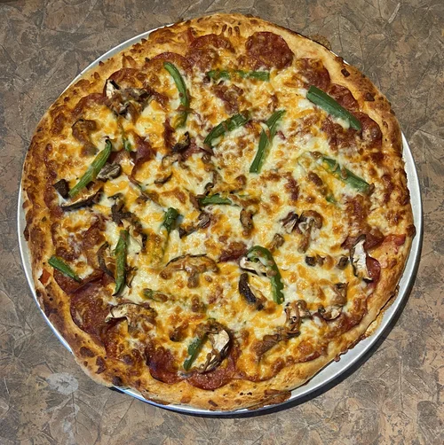 Pizza maison toute garnie