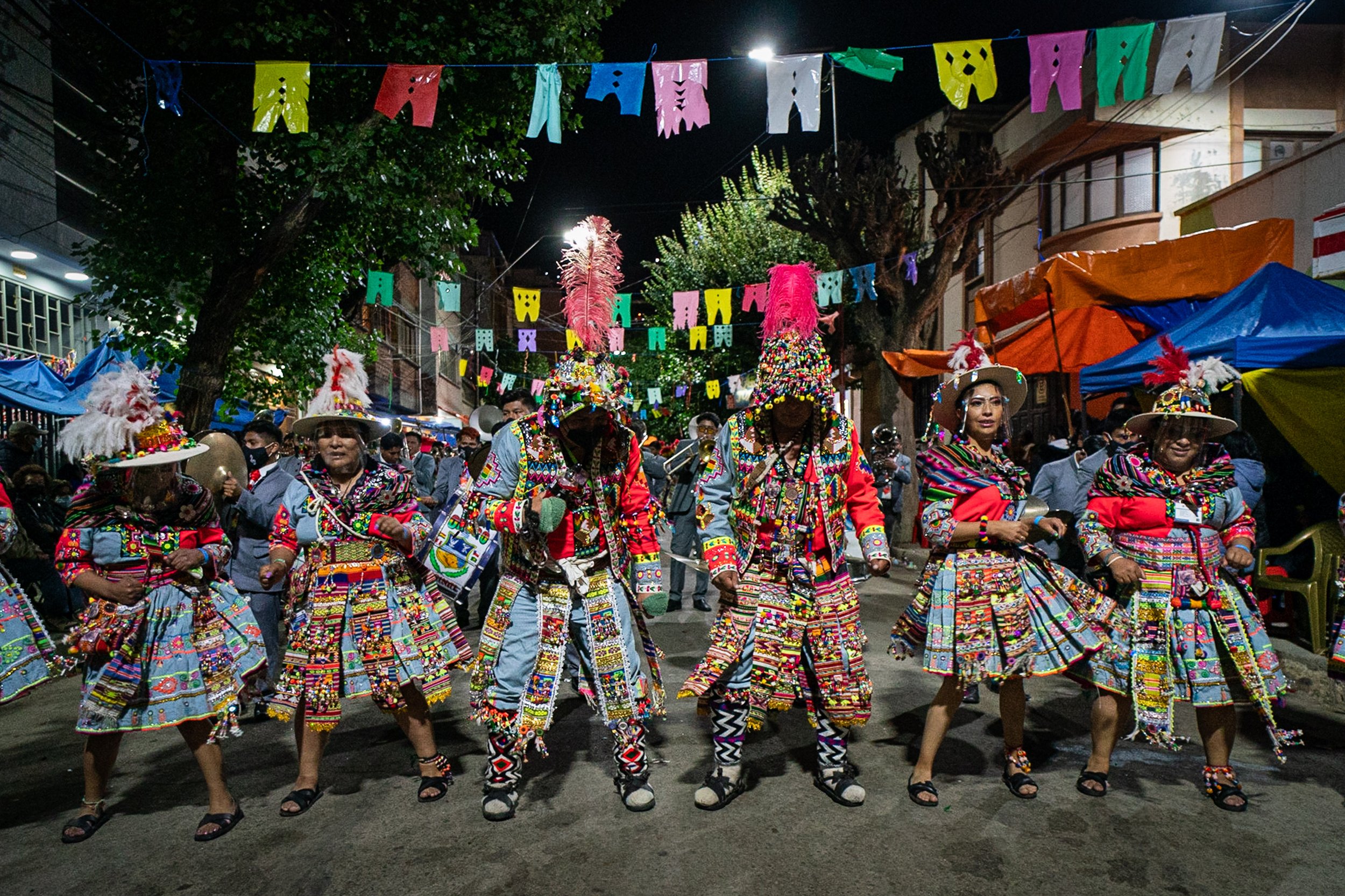 Tinku dancers in grey during the Peregrinación