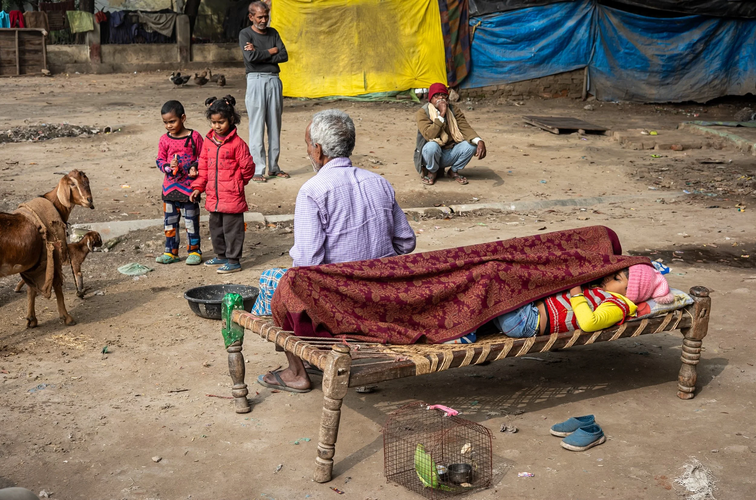Scene with children and older men in Allahabad