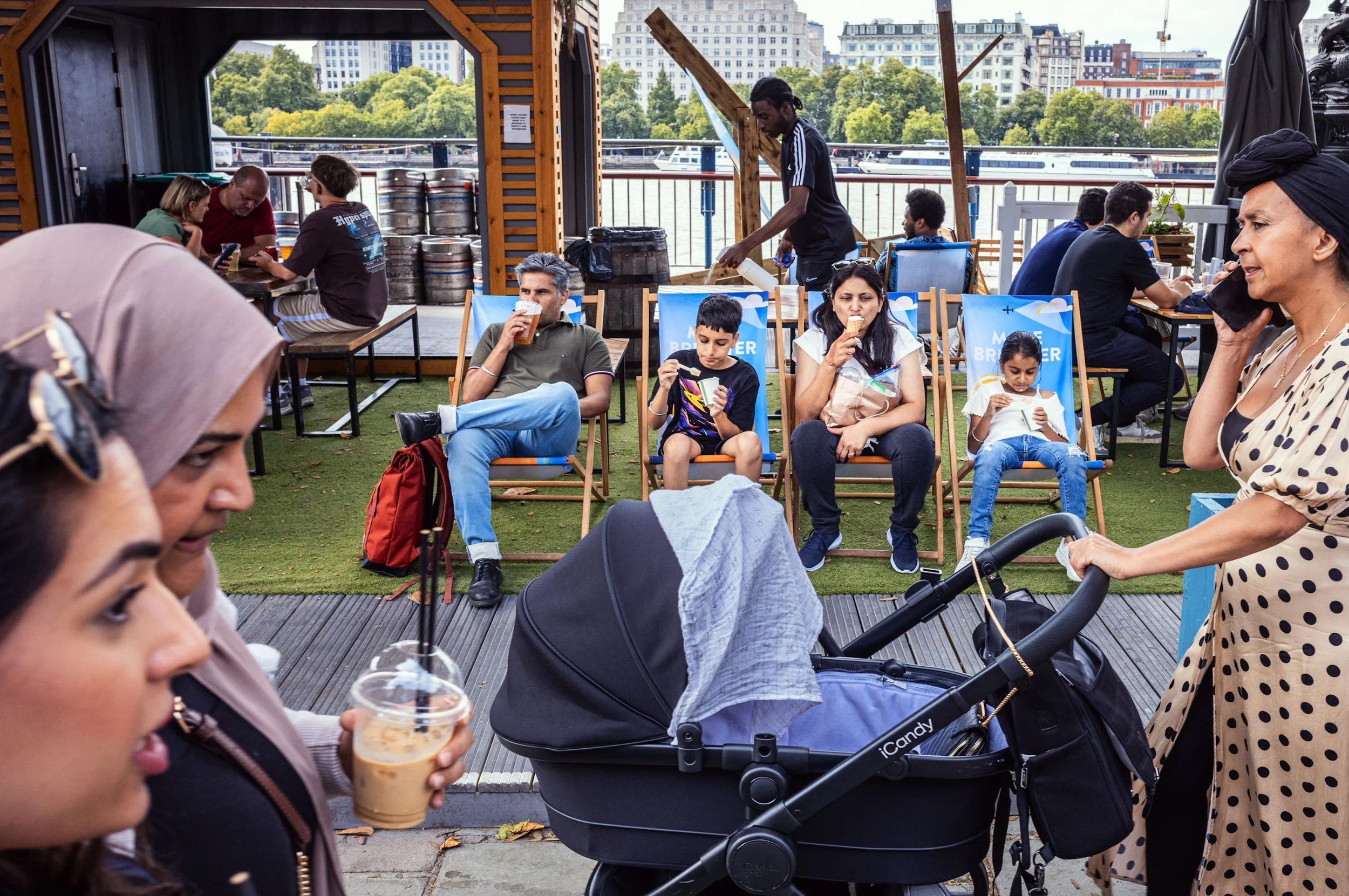 Family group lounging on Southbank in London