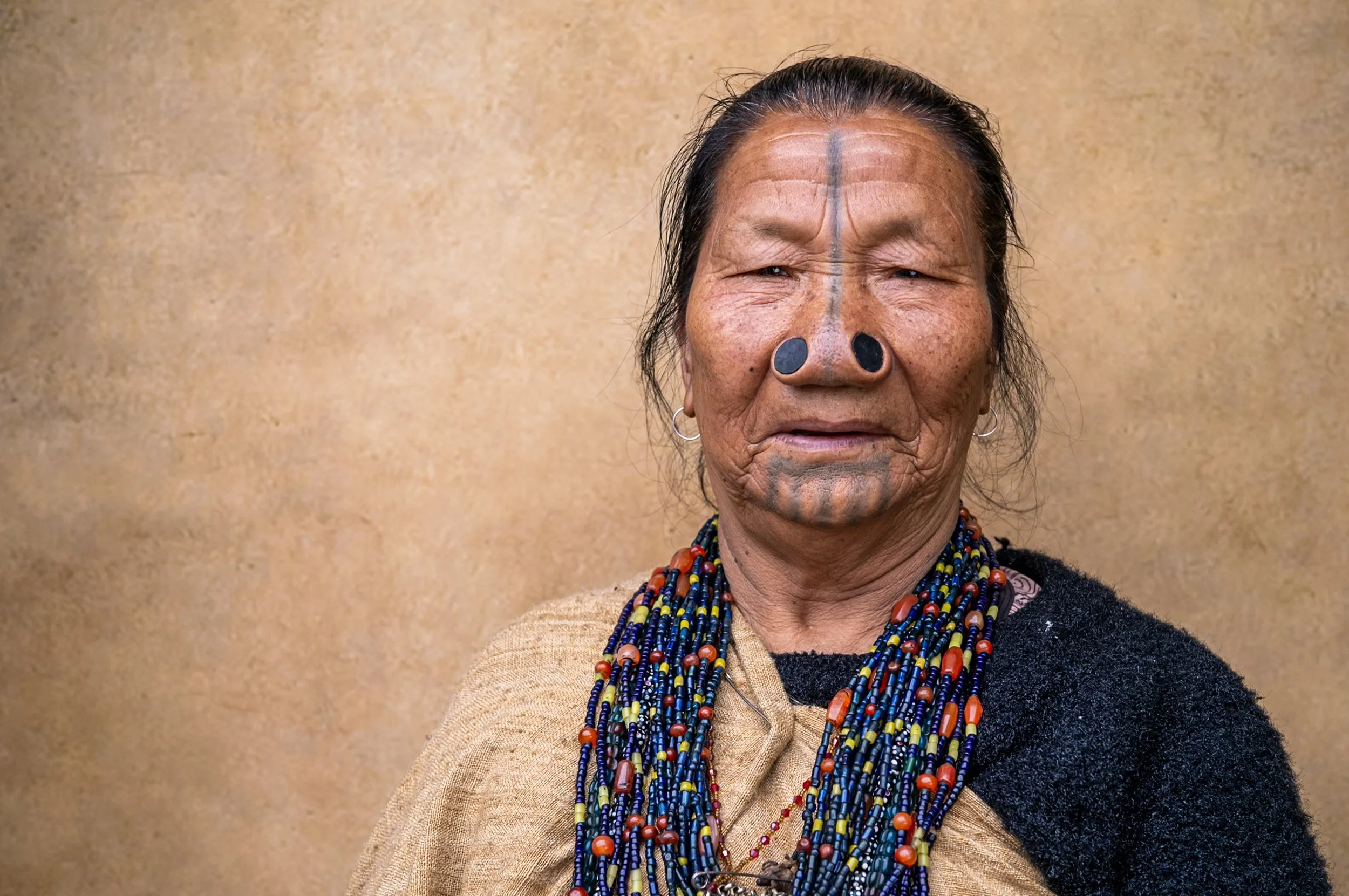 Portrait of Apatani woman in traditional garb 2