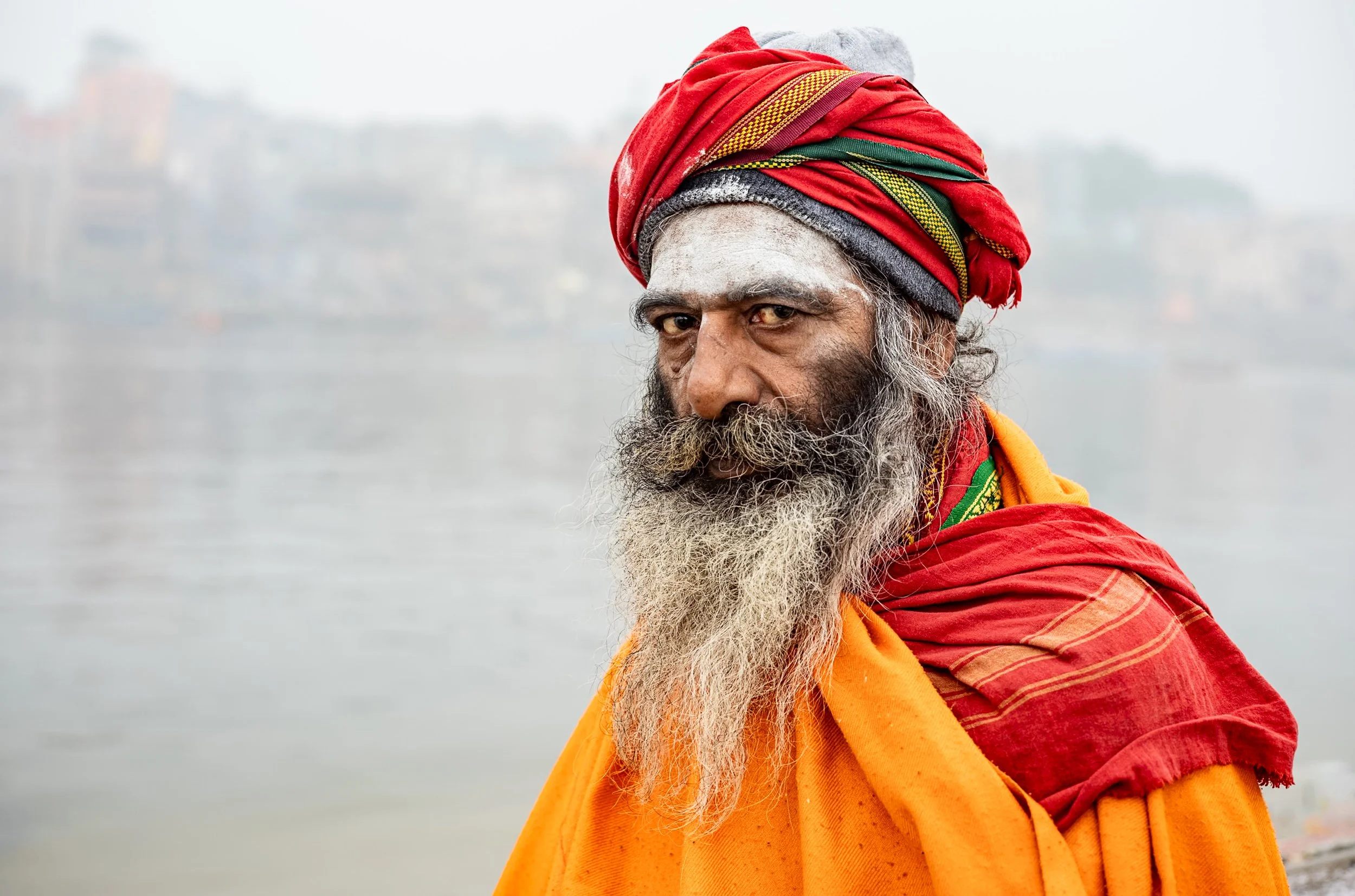 Portrait of sadhu on light background in Varanasi