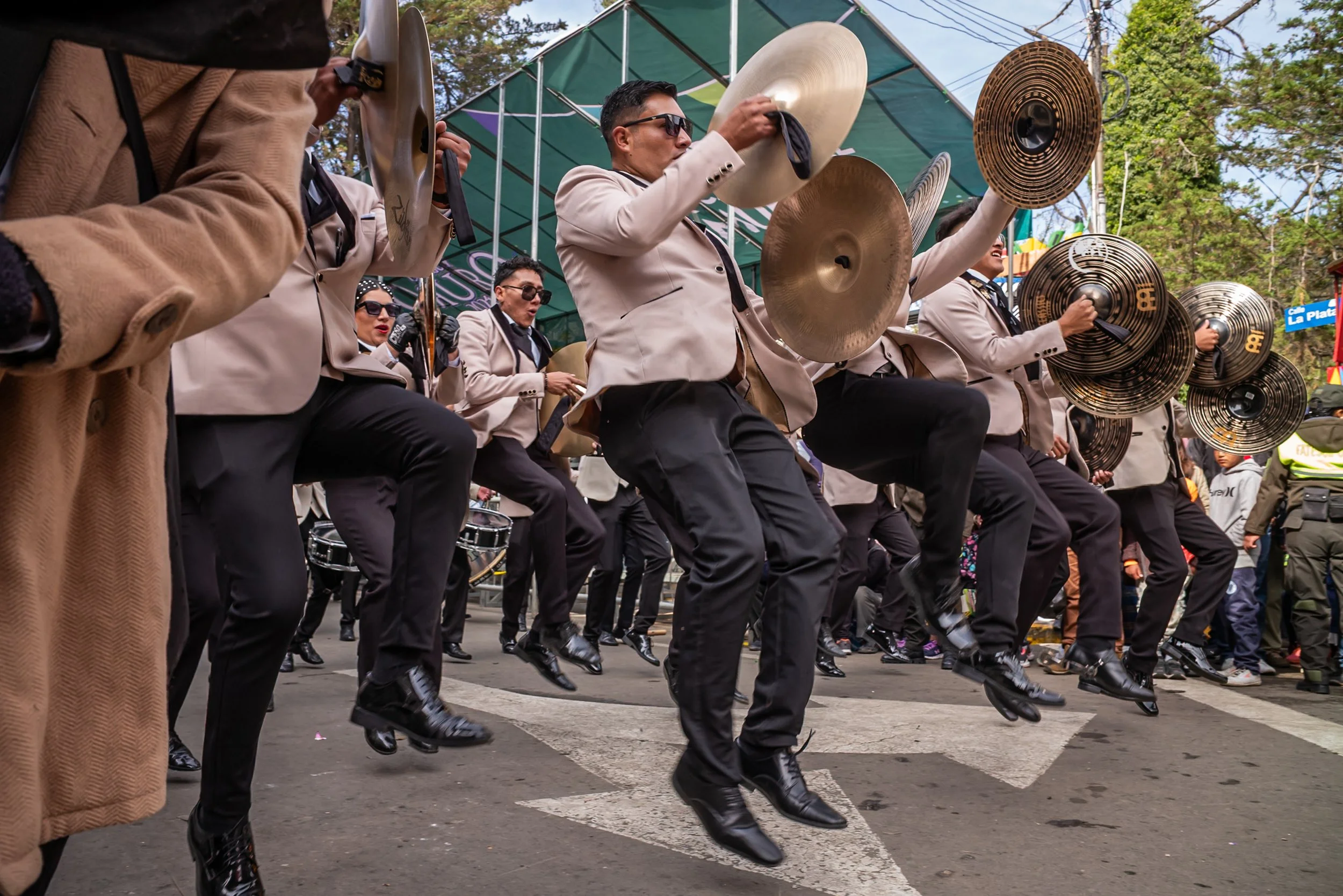 Musicians jumping during the Peregrinación