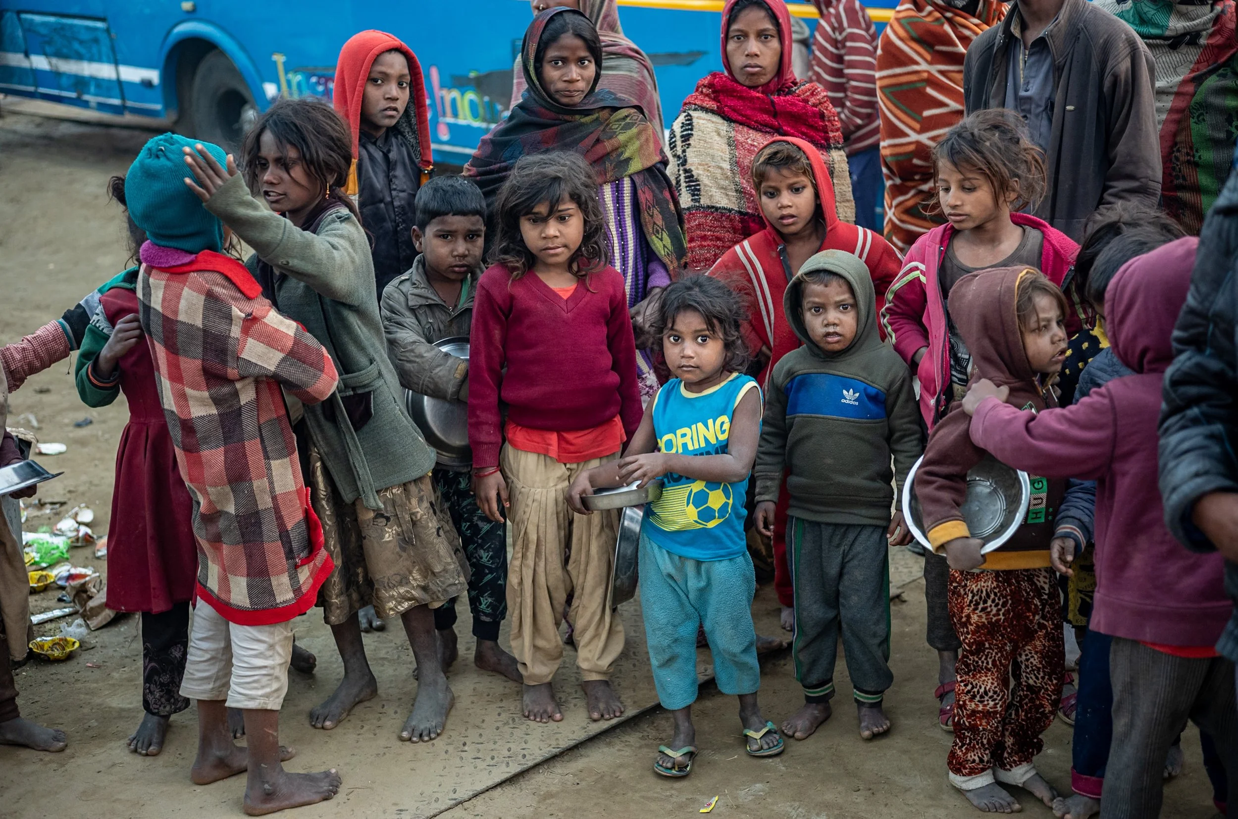 Children waiting to be let in for food in Allahabad 
