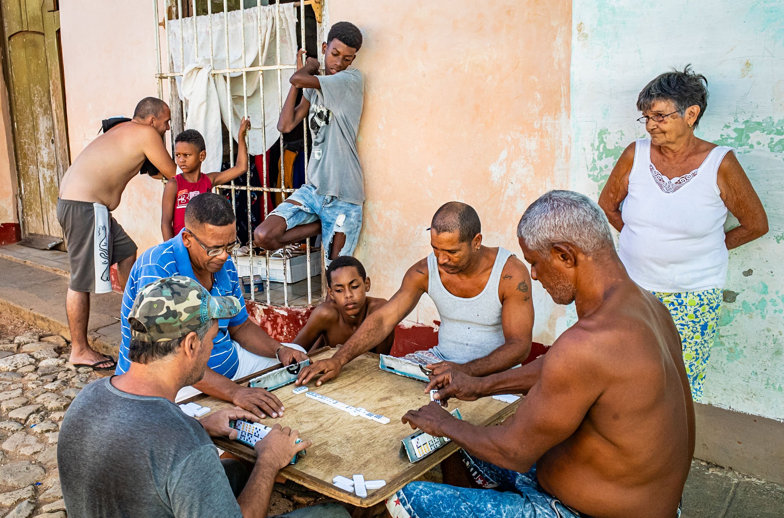 Group playing dominoes o the street in Trinidad 1