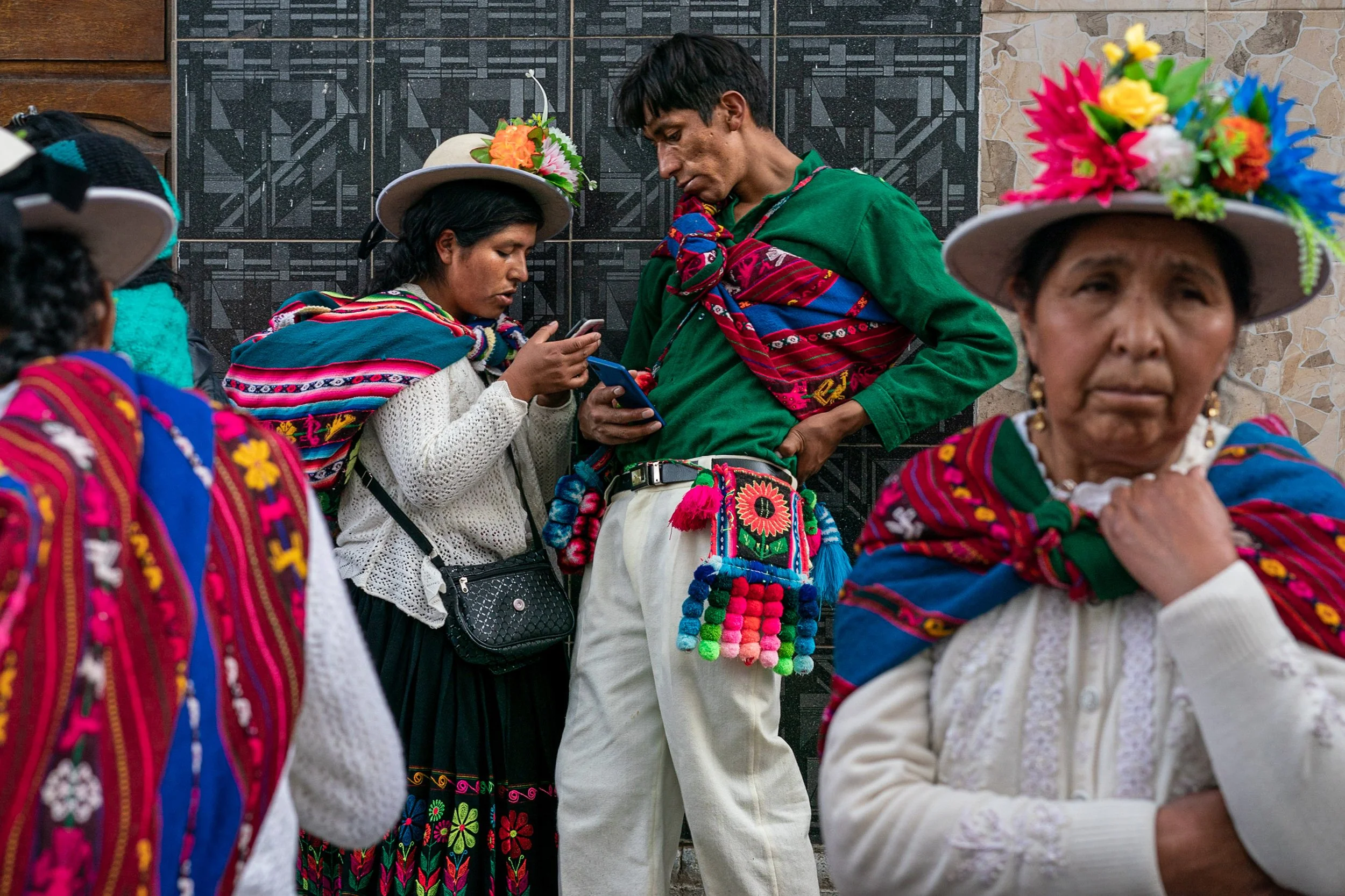Man flirting with woman during Andean Anata