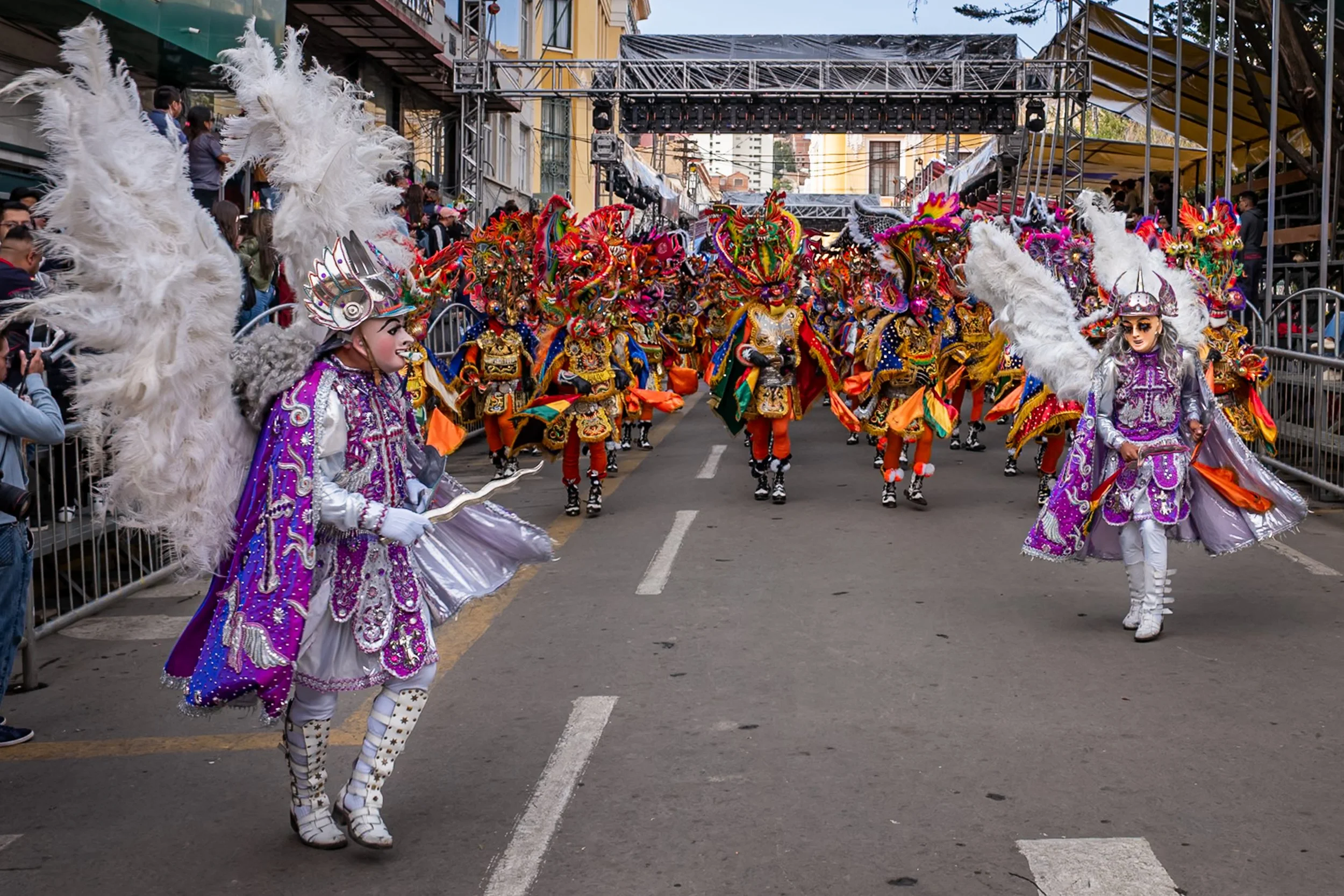 Archangel Michael masks leading Diablos during the Peregrinación