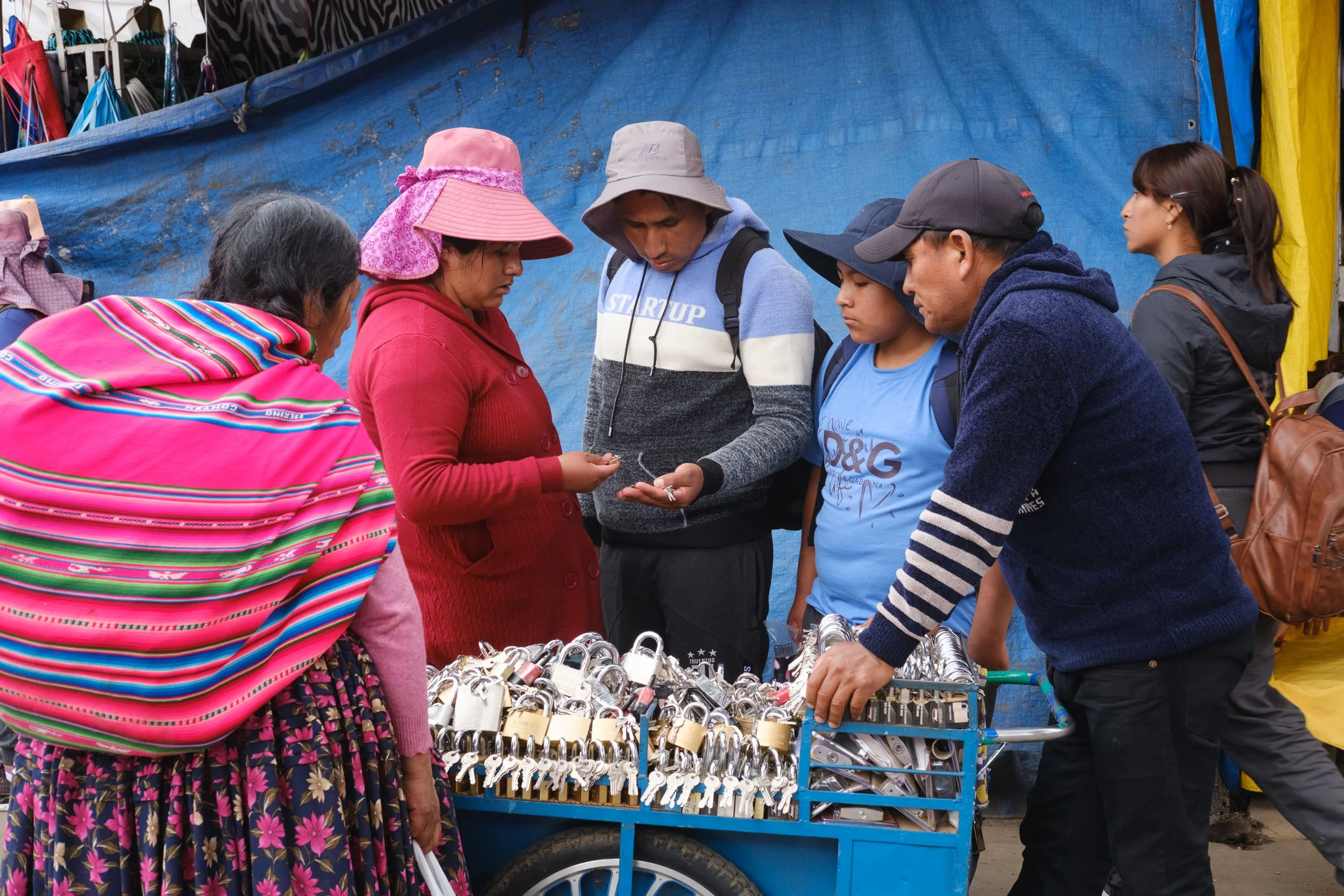 Padlock seller in La Cancha market