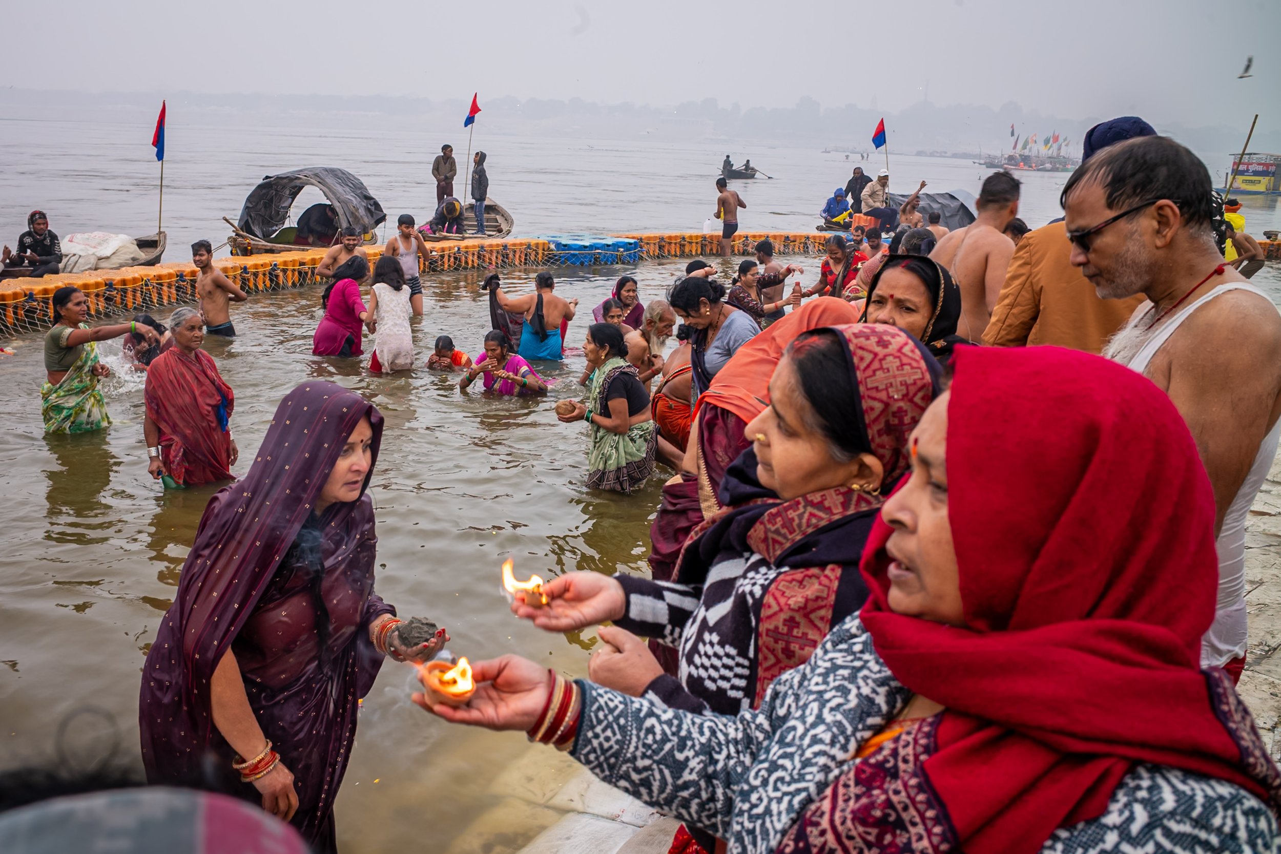 Women praying during Magh Mela in Allahabad