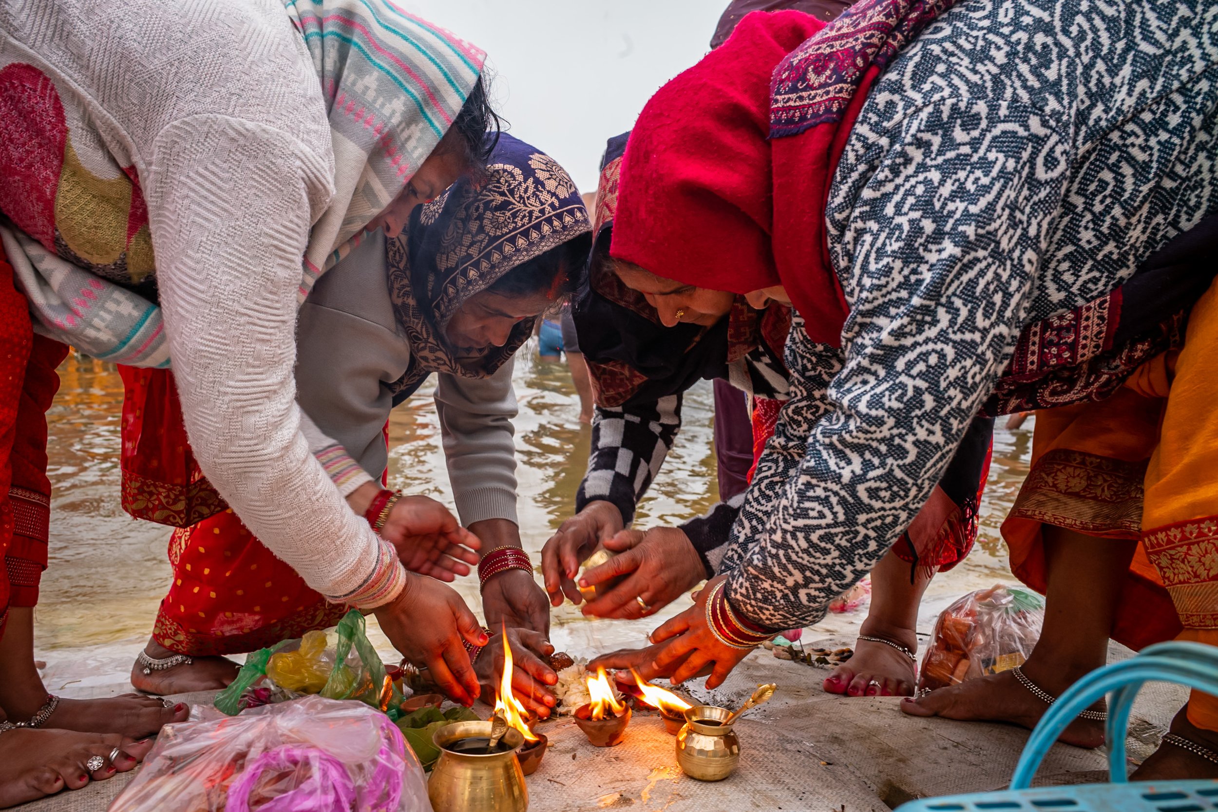 Women making offers during Magh Mela in Allahabad
