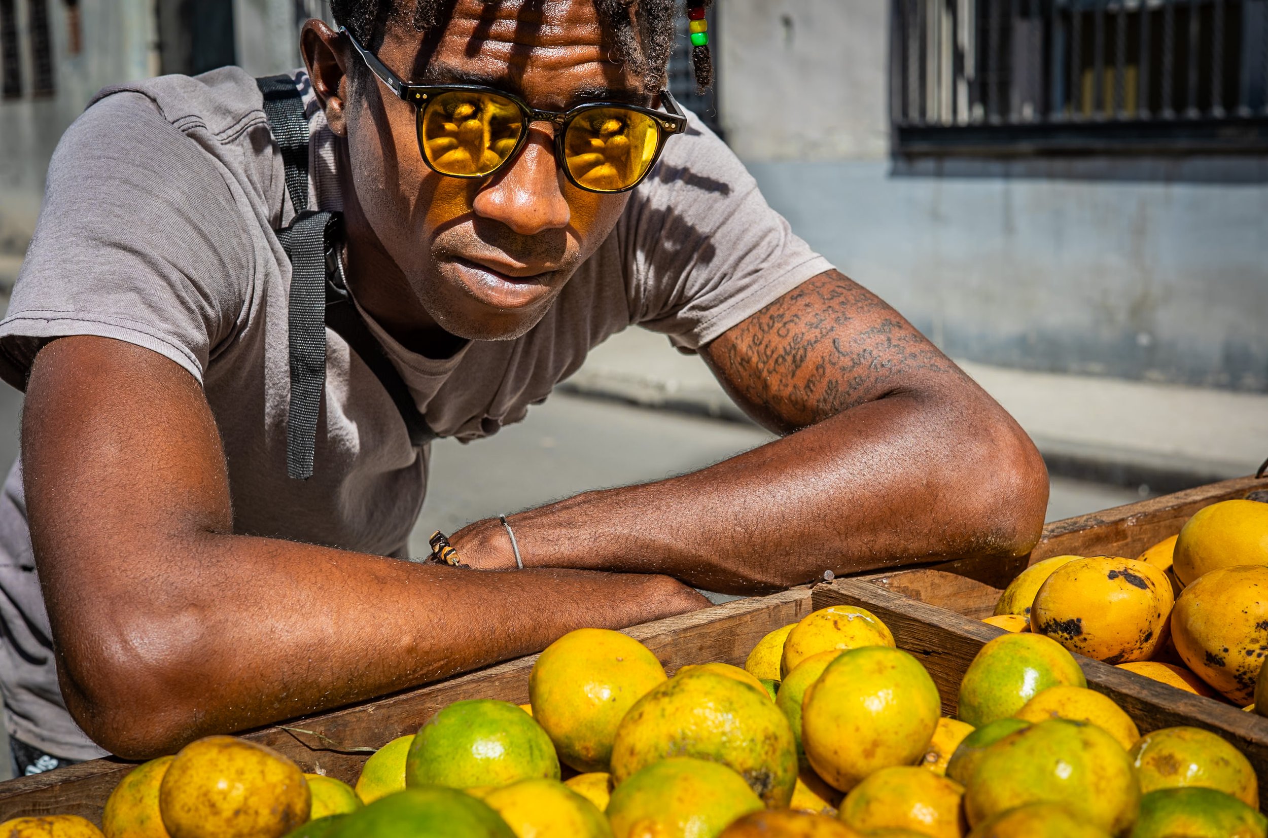 Lemon seller with yellow glasses