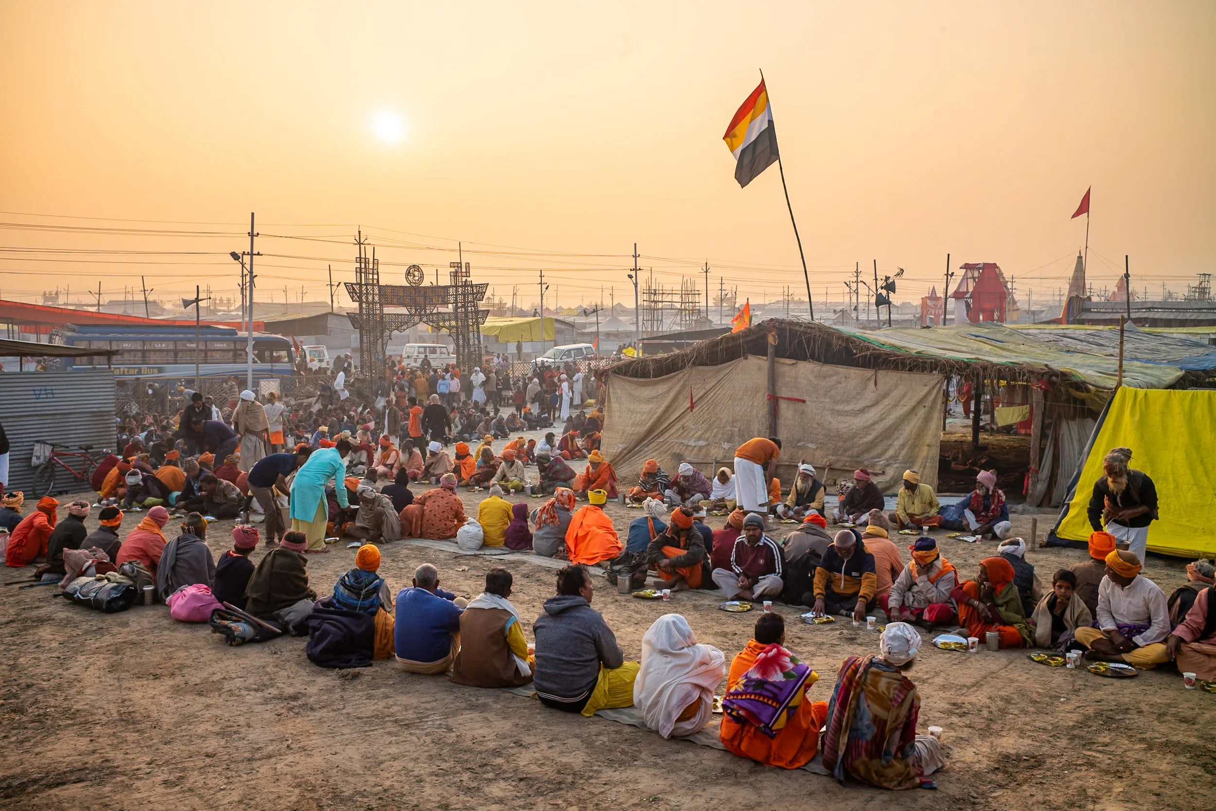 Men having for offered by sadhus in Allahabad