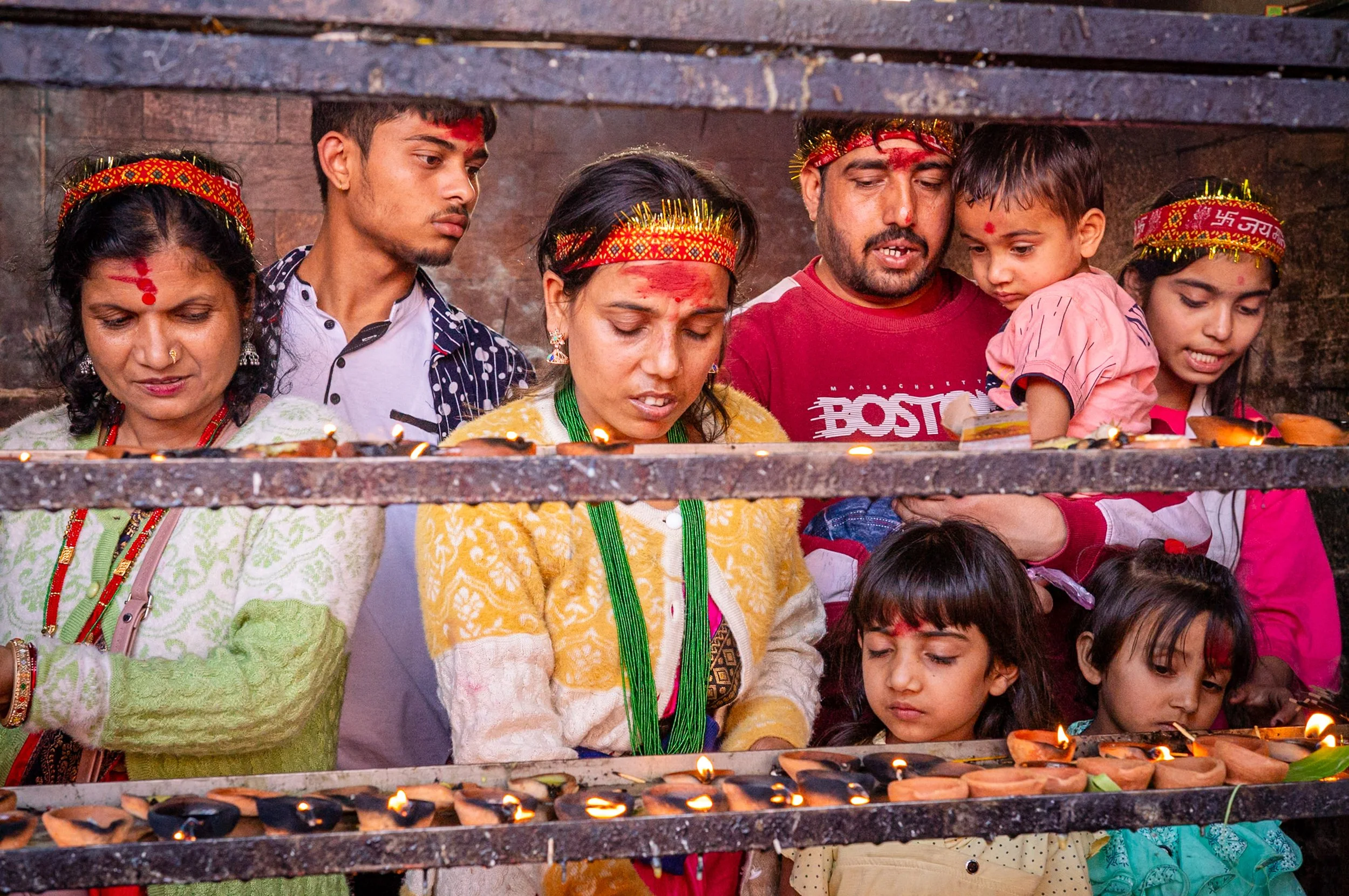 Devotees lighting offerings in Guwahati Kamakhaya temple