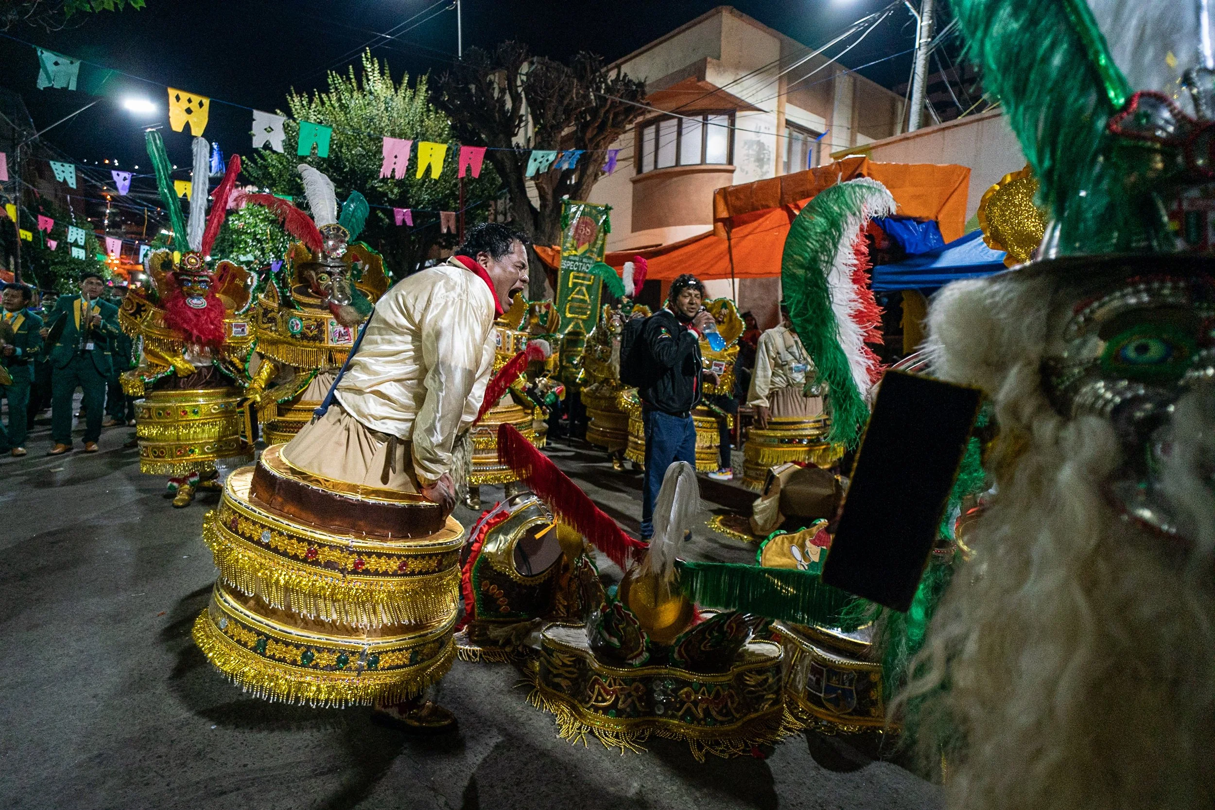 Moreno dancer relieving some weight while resting during the Peregrinación
