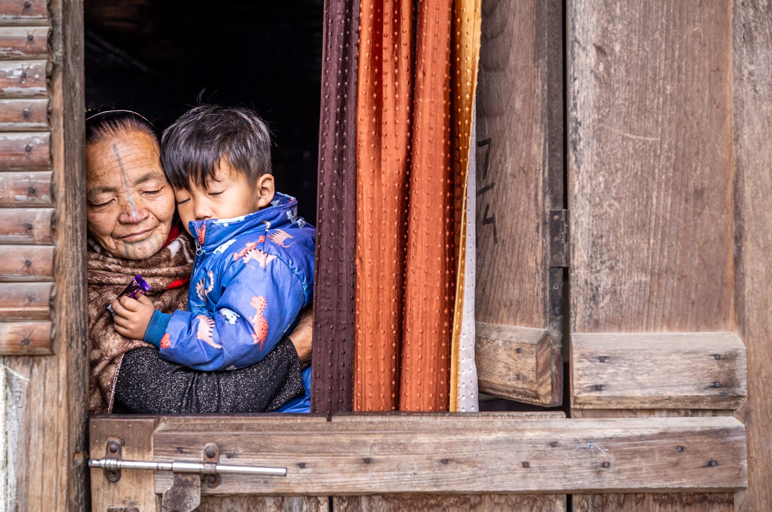 Portrait of Apatani woman with small child