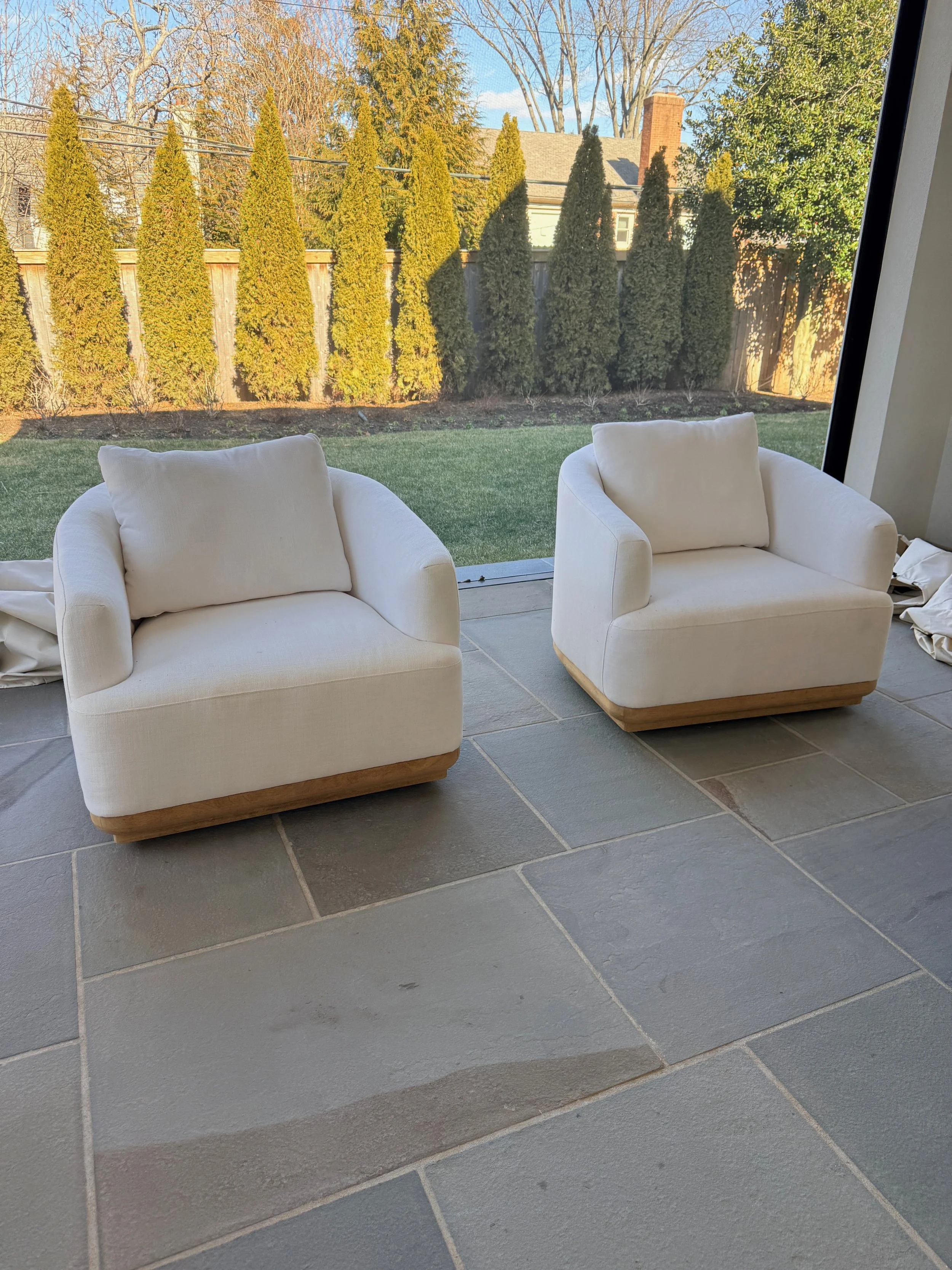 Pair of  RH Oslo Swivel Outdoor Lounge Chairs