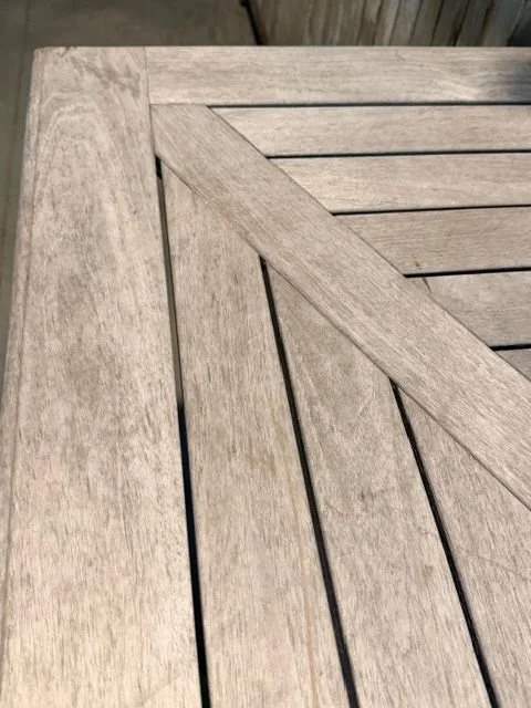 upton teak table corner dry.jpeg