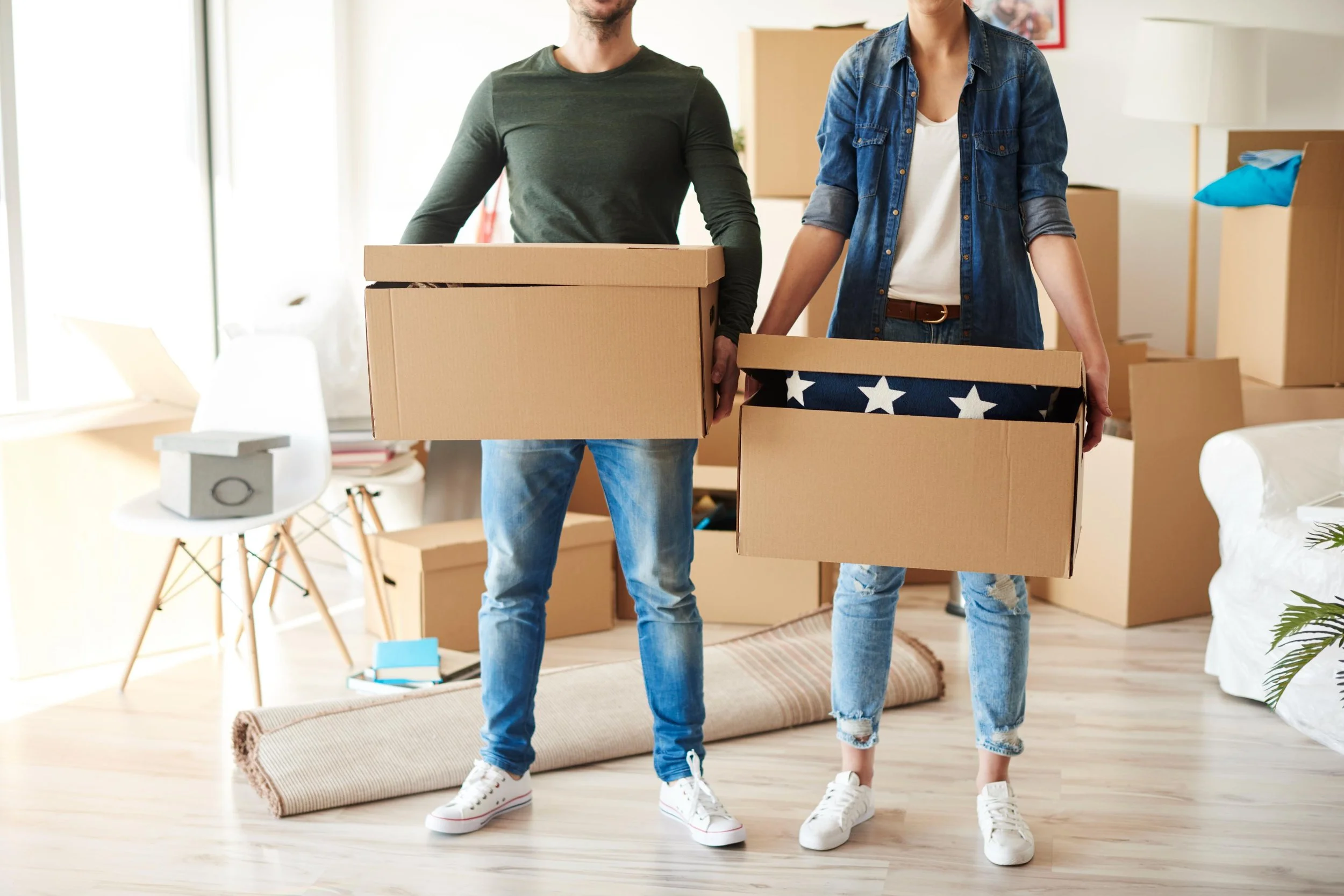 front-view-couple-with-cardboard-boxes (1).jpg