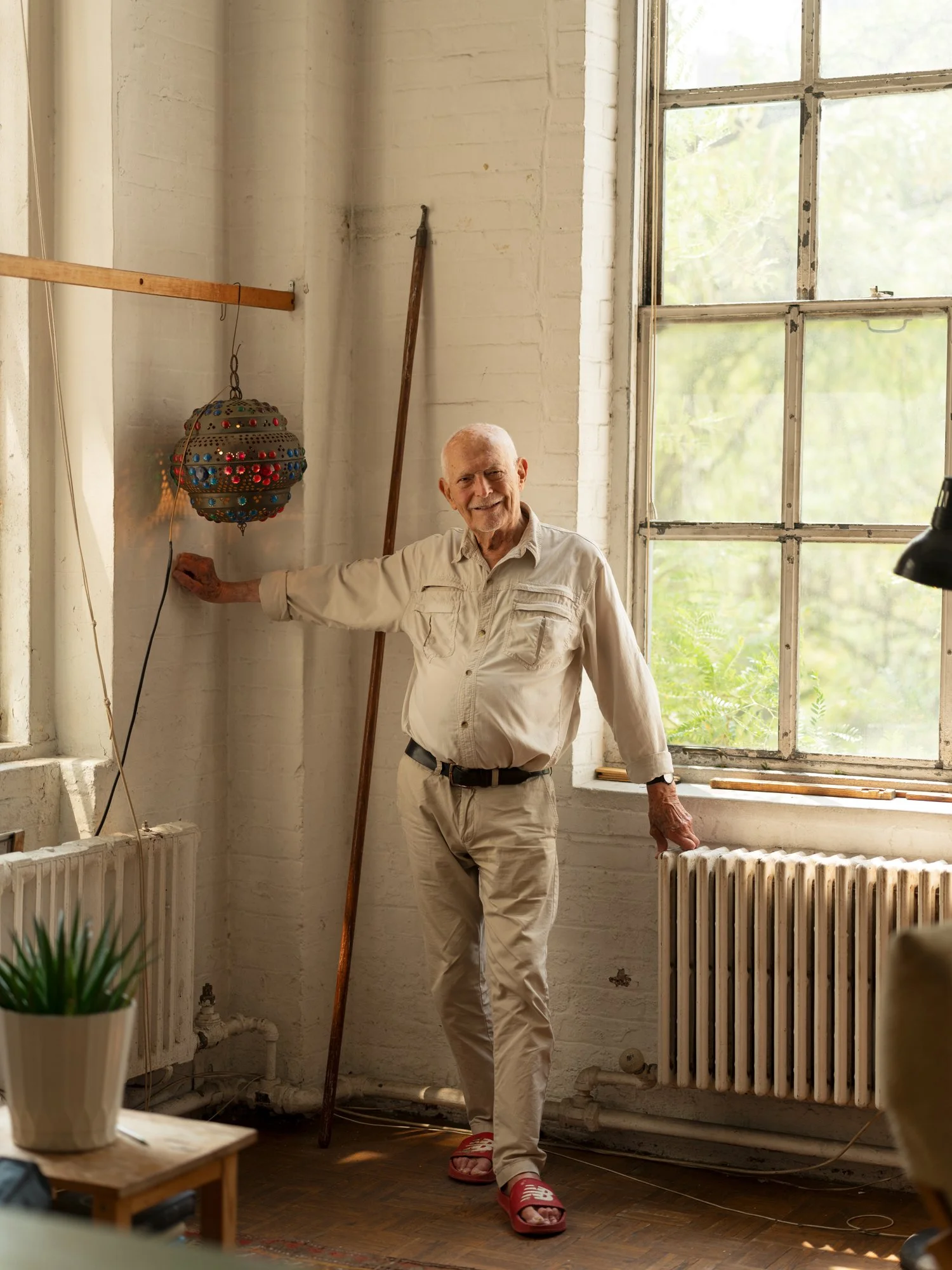 Edward Field photographed at age 101 in his home at Westbeth Artist Community, where he's lived for 53 years. New York City, July 2025