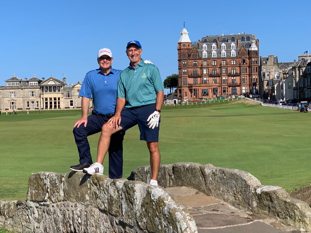  July 2019 - David and Randy Farless on the Swilcan Bridge at St. Andrews. 