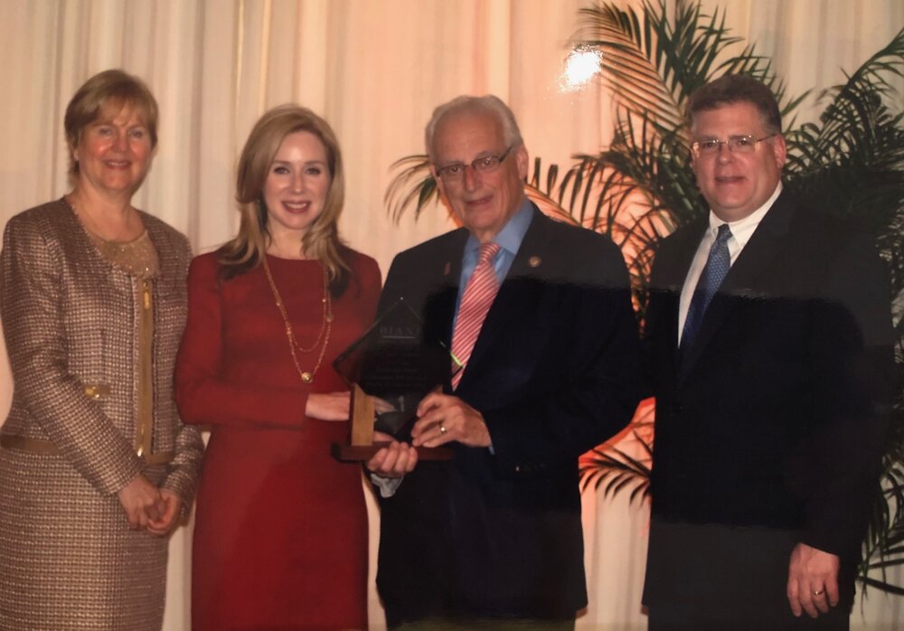  Presenting an award to New Jersey Congressman Bill Pascrell at a Brain Injury Alliance Gala. 
