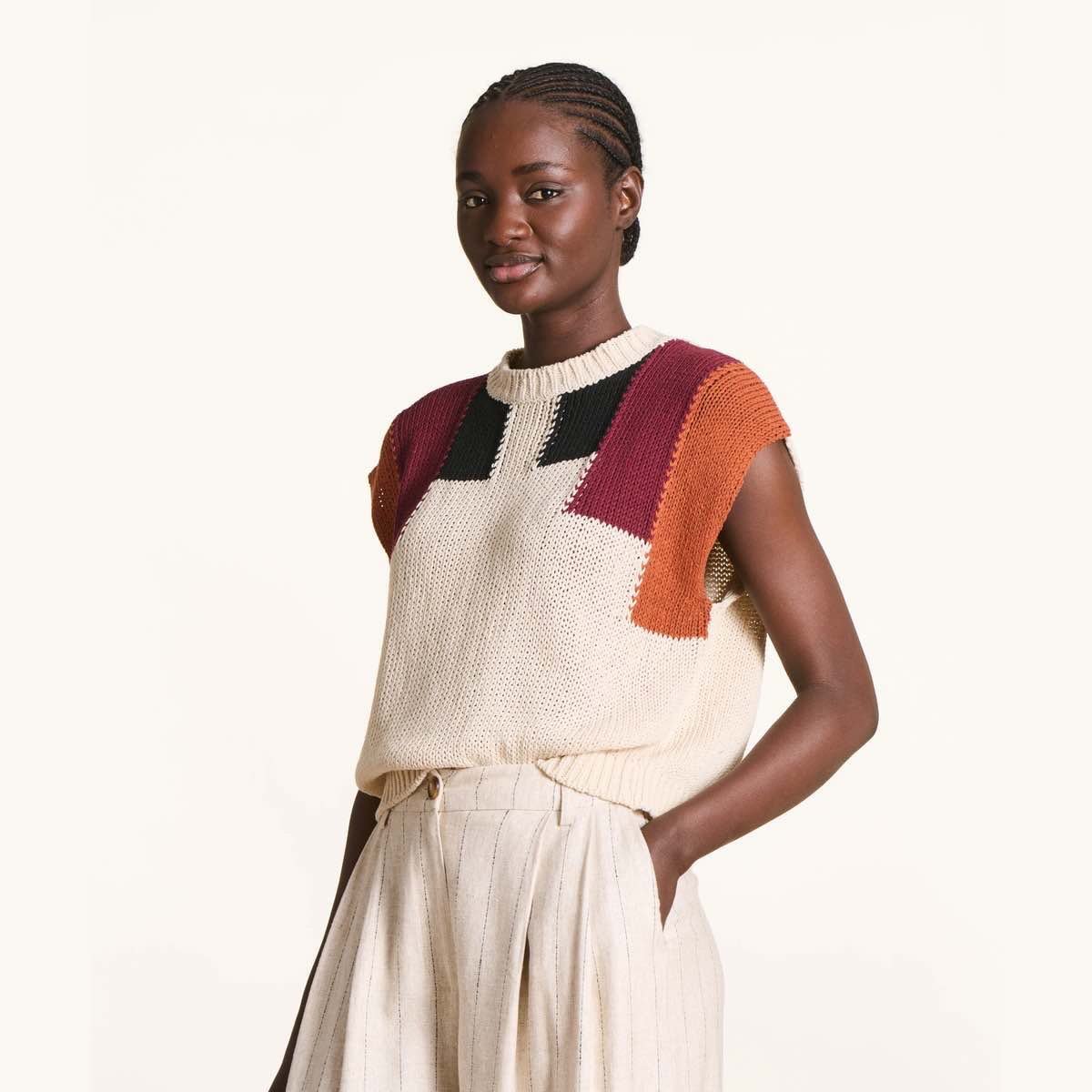 Color blocked spring sweater, available in boutique or online.