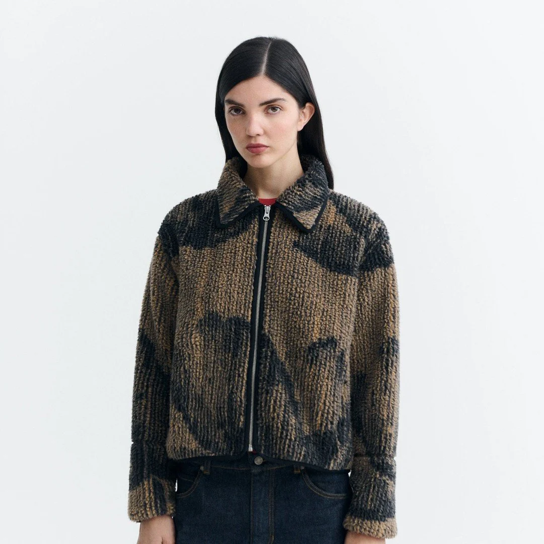 Some leaves fall. These just get cozier. A teddy fleece jacket from Barcelona's Thinking Mu, with dark lotus leaves on warm brown. Find it, and the rest of our new arrivals, at Florodora or florodora.com.