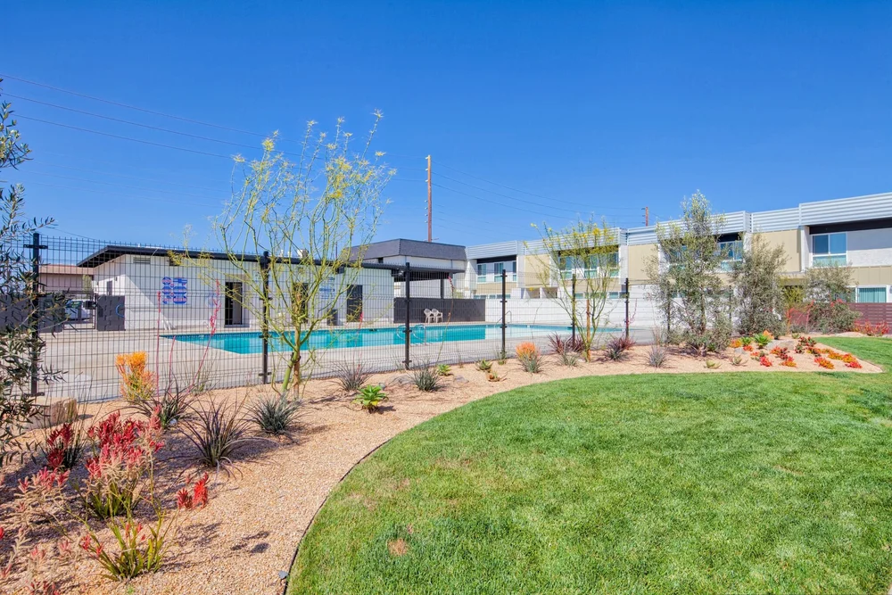  Sycamore Court’s contemporary community is decorated by a clean California desert landscape of cacti, succulents and stone.  
