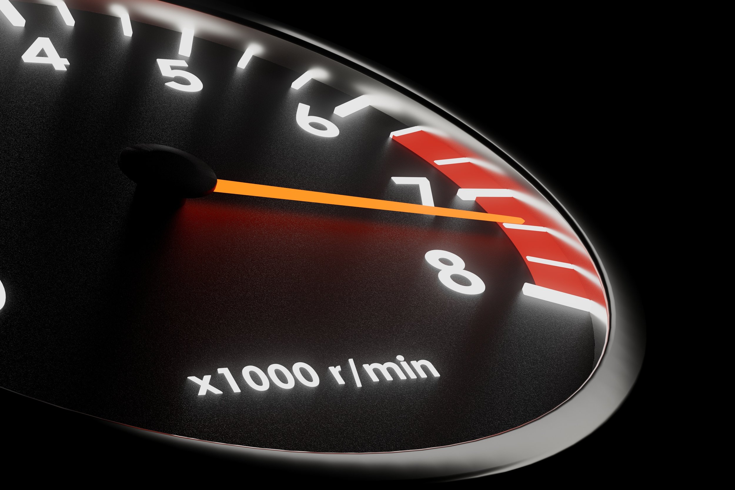Speedometer with orange dial in the red zone