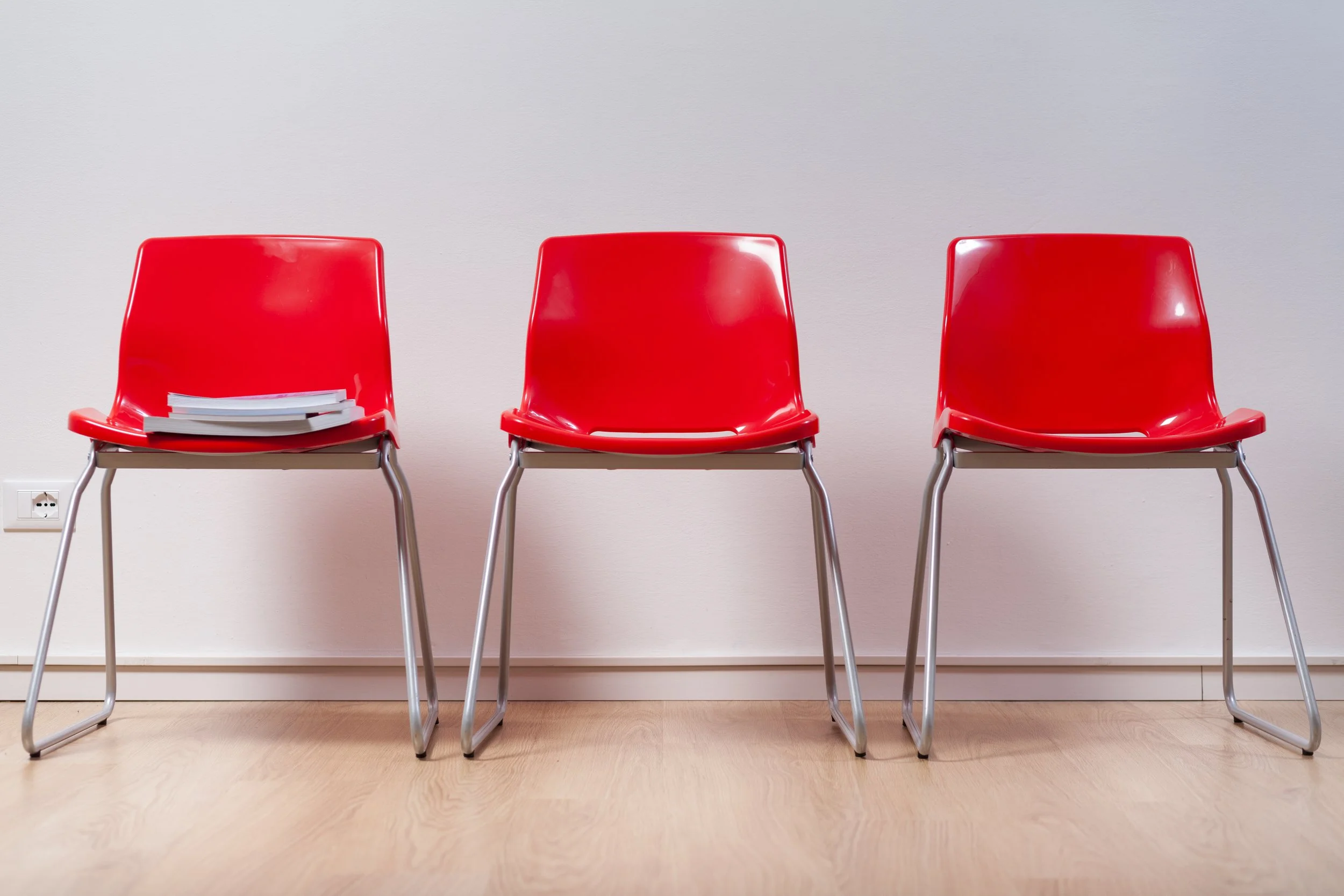 Red chairs in a neat row