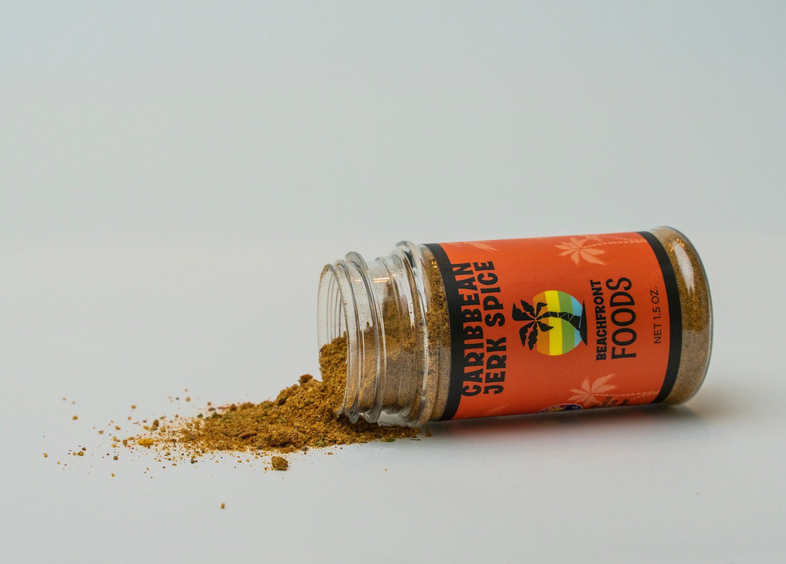 Jerk_Spice_Bottle_Spilling_Front_(White background).jpeg