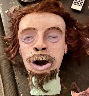 Process picture of layering and attaching hair