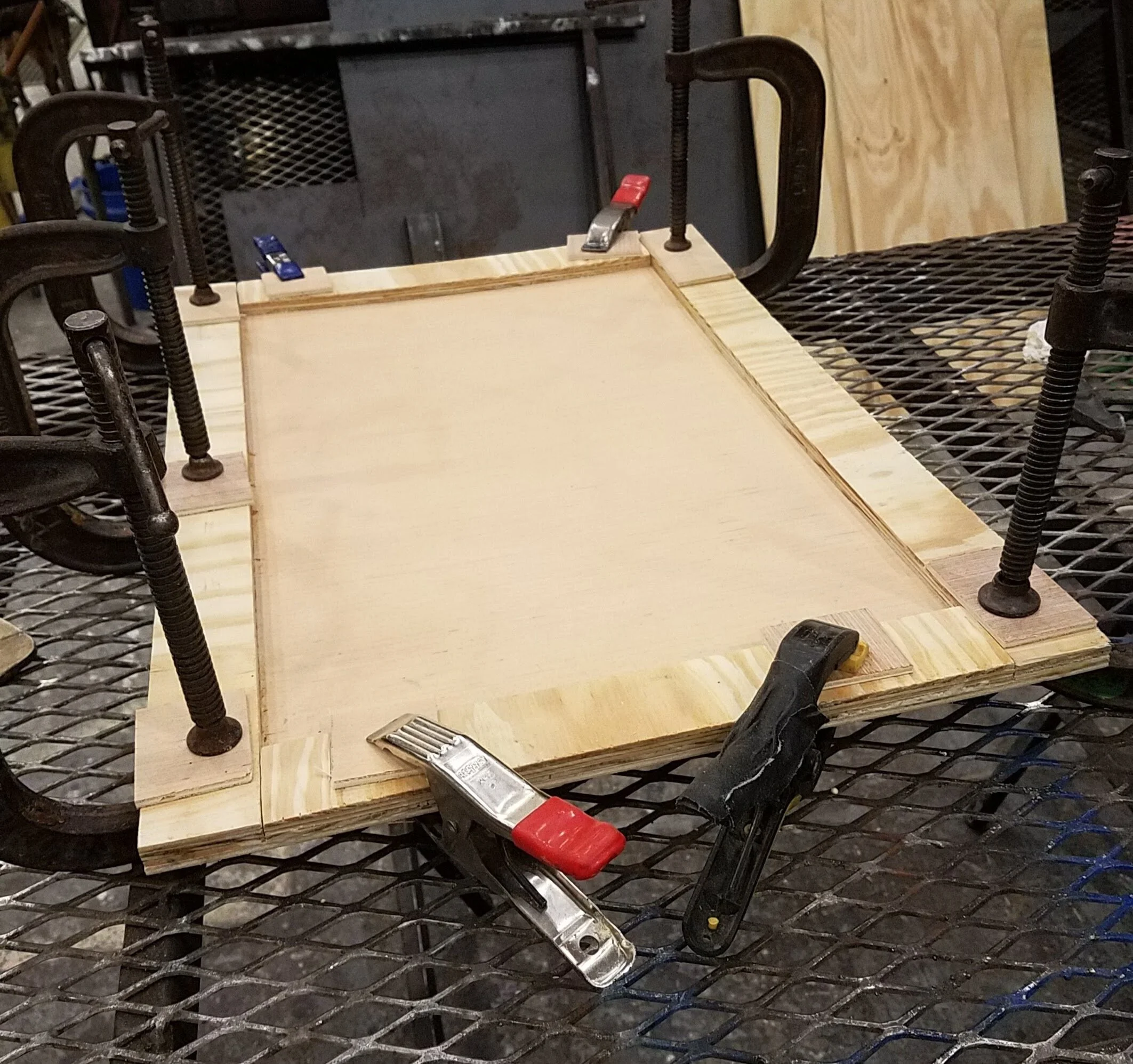 Cabinet doors given depth by lamenting a wood edge