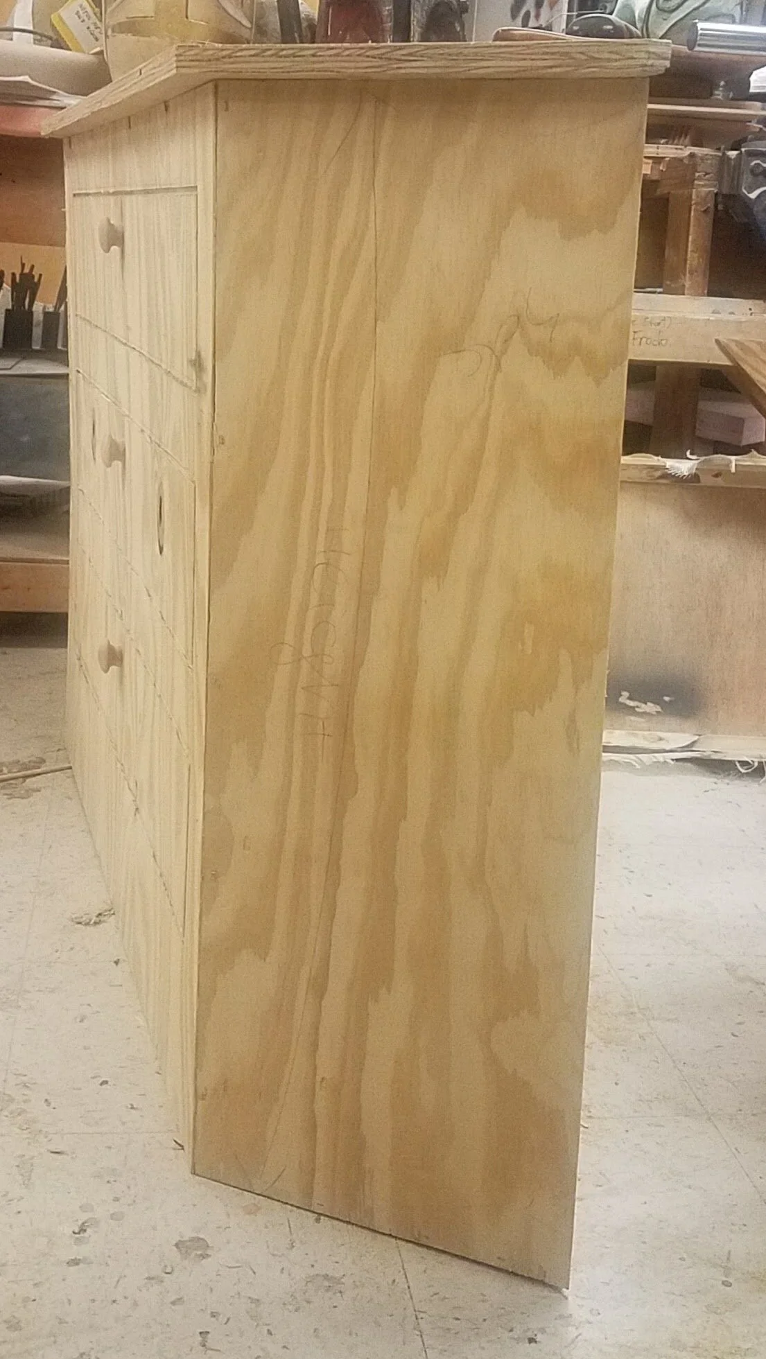 Drawers are a facade using a router to give create the outline