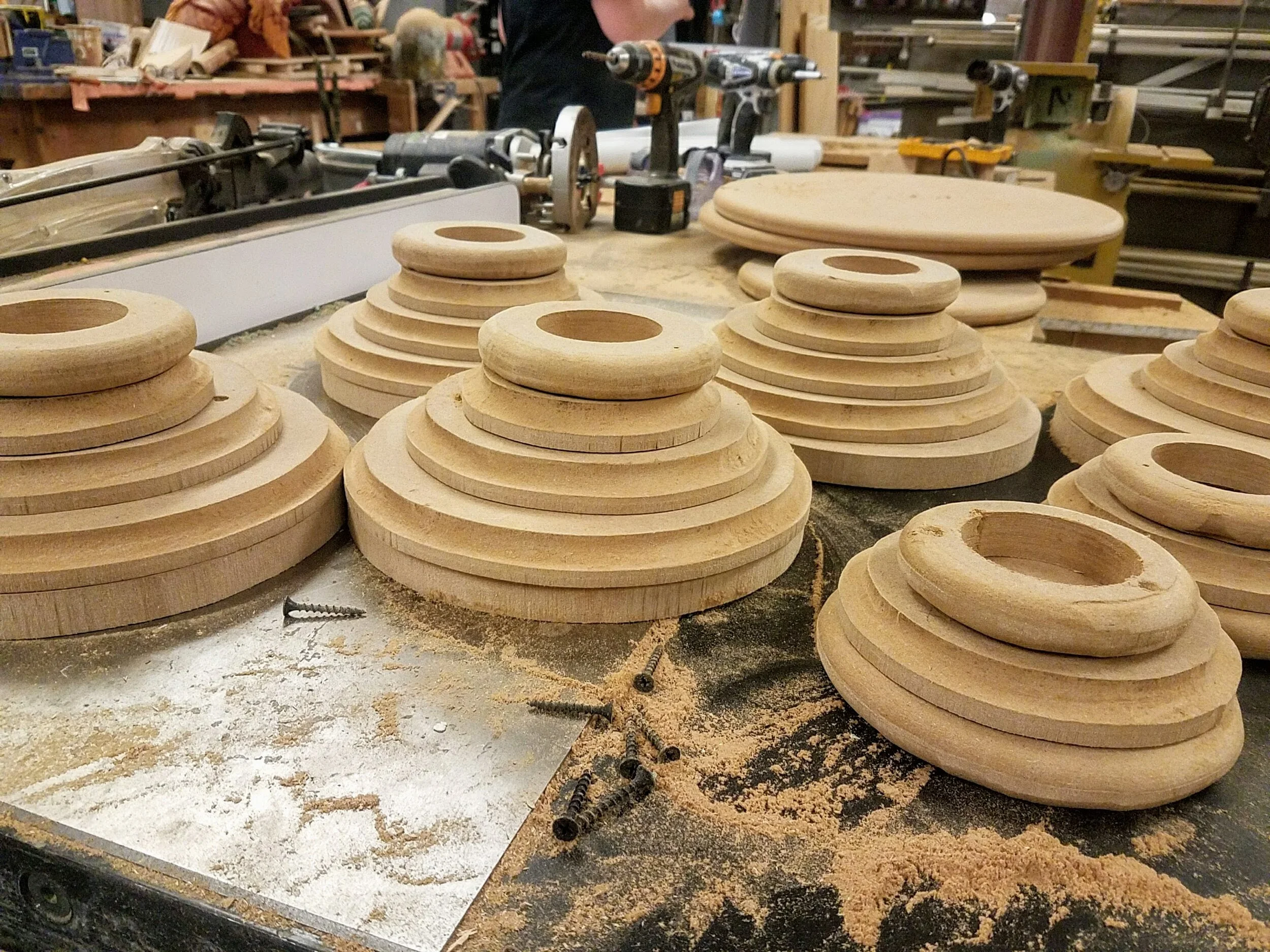 MDF rings cut in the bandsaw and followed with a hole saw for the top and bottom on the cake pedestals