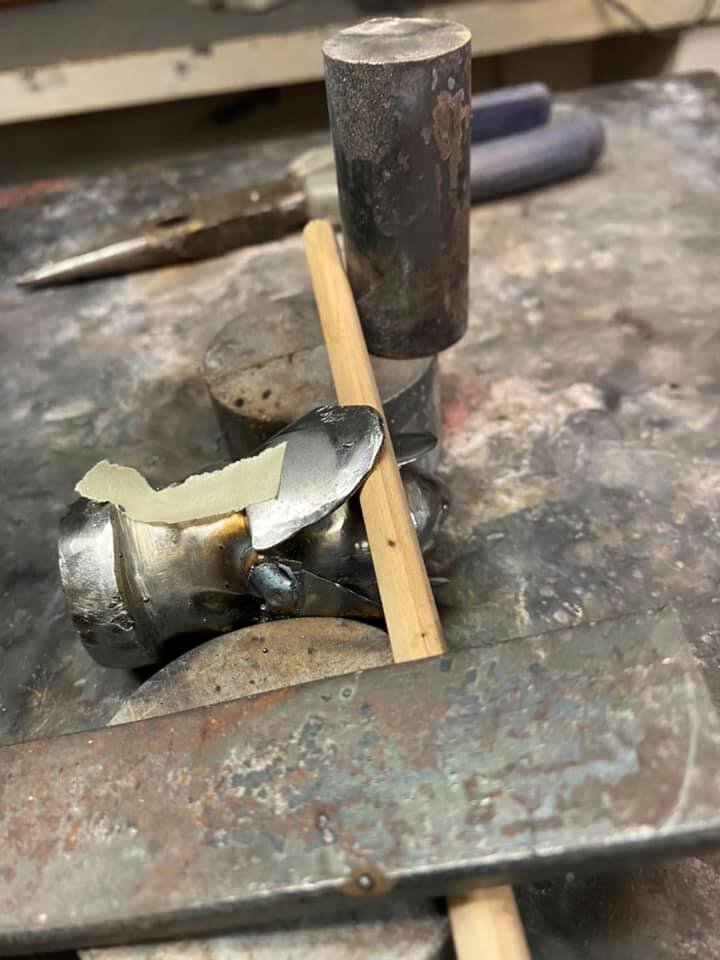 Process photo of attaching petals