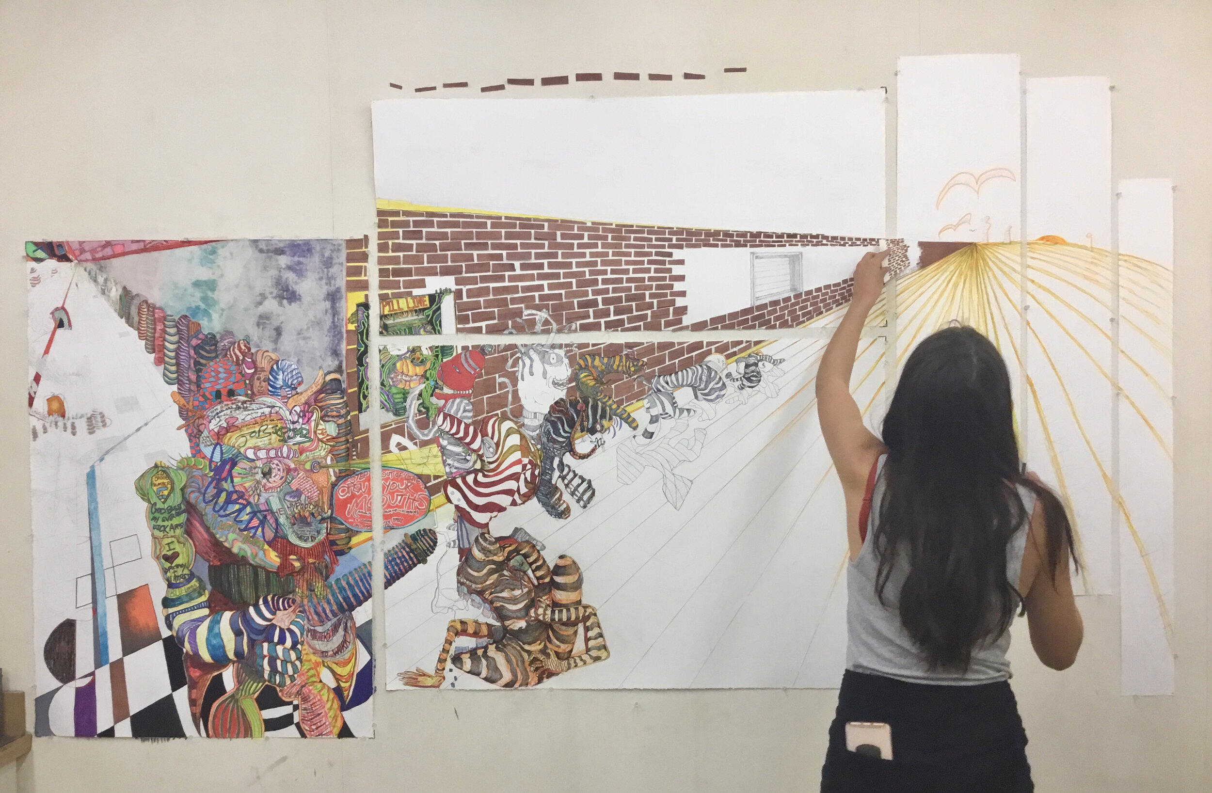 Alissa working on a collage in the studio