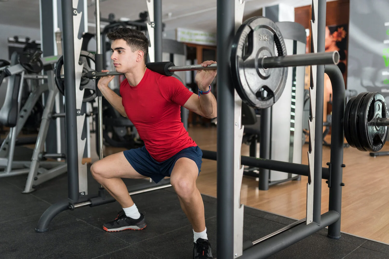 An athletic male undergoing exercise rehabilitation and strength &amp; conditioning