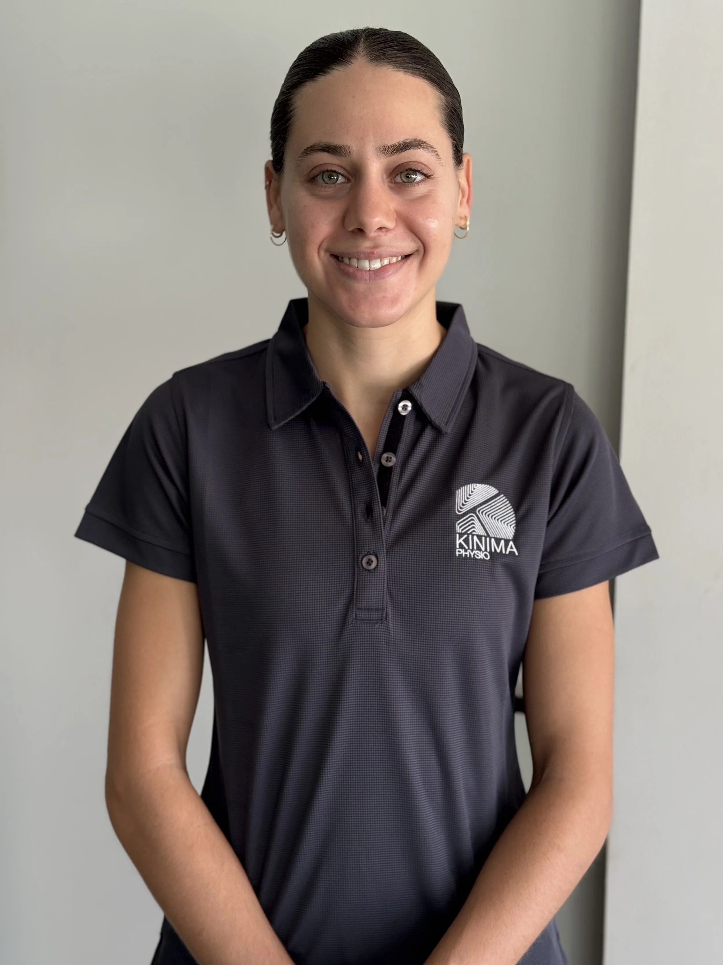 Caitlin Vallelonga, Physiotherapist at Kinima Physio West Leederville, with a special interest in evidence-based musculoskeletal rehabilitation and post-injury recovery
