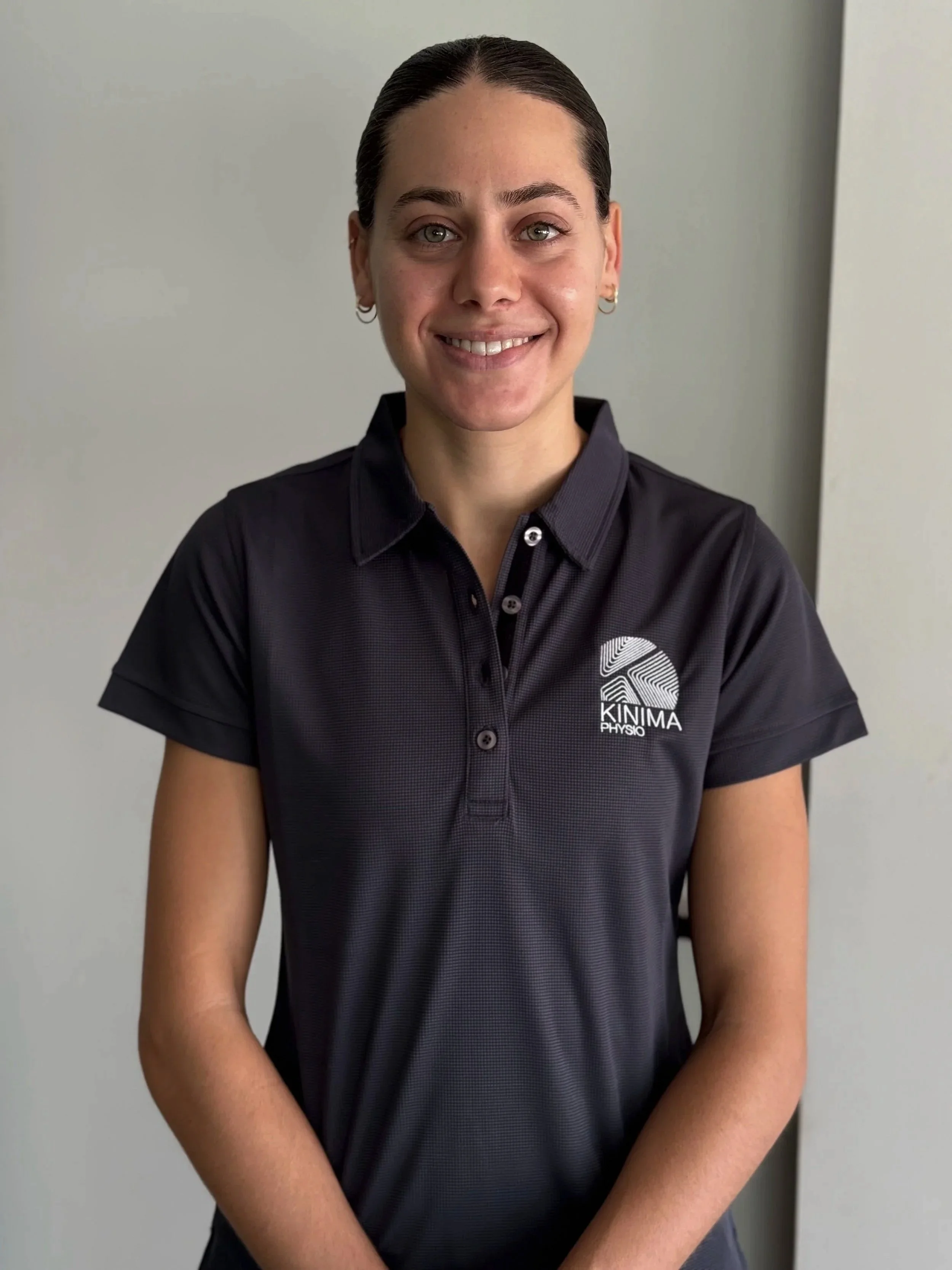 Caitlin Vallelonga, exercise Physiotherapist at Kinima Physio West Leederville, with a special interest in evidence-based musculoskeletal rehabilitation and post-injury recovery