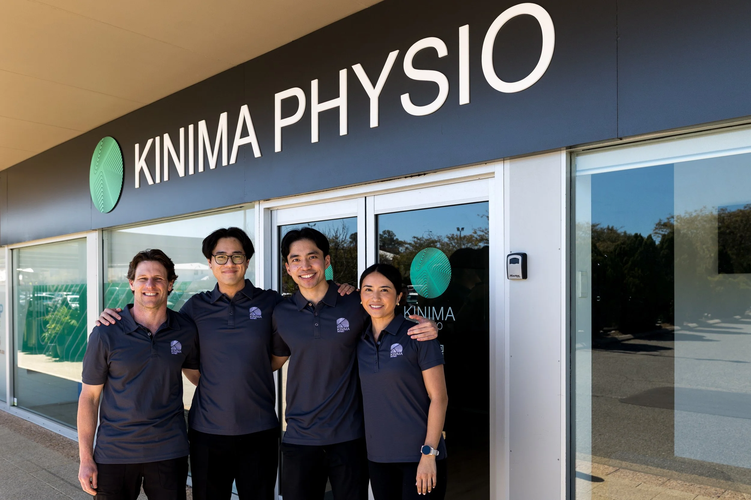 Friendly physiotherapists welcoming clients to Kinima Physio Gwelup