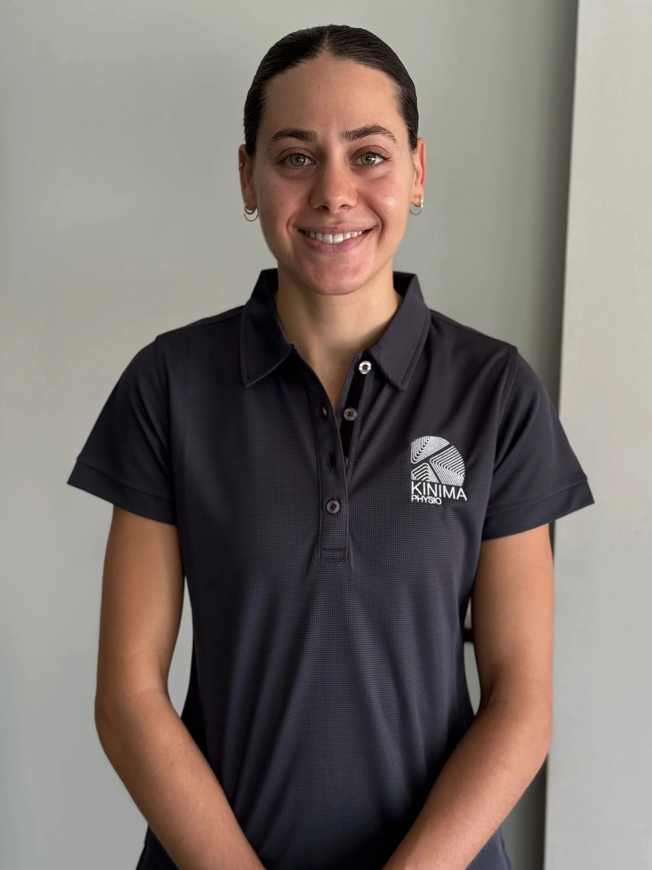 Caitlin Vallelonga, exercise Physiotherapist at Kinima Physio West Leederville, with a special interest in evidence-based musculoskeletal rehabilitation and post-injury recovery