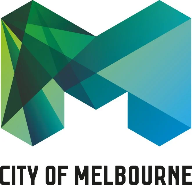 A geometric, multicolored logo of the city of Melbourne with overlapping green and blue polygons.