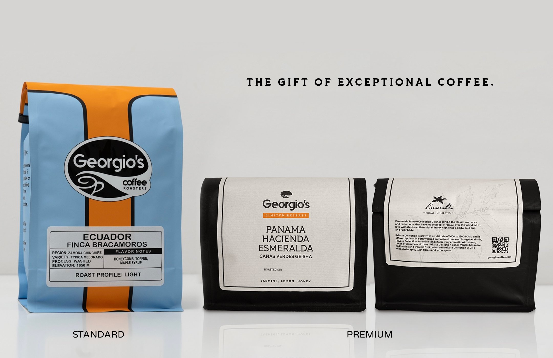 Three bags of Georgio's Coffee. From left to right: standard Ecuador Finca Bracamoros, premium Panama Hacienda Esmeralda, and an unknown dark roast. The text states 'The gift of exceptional coffee'.