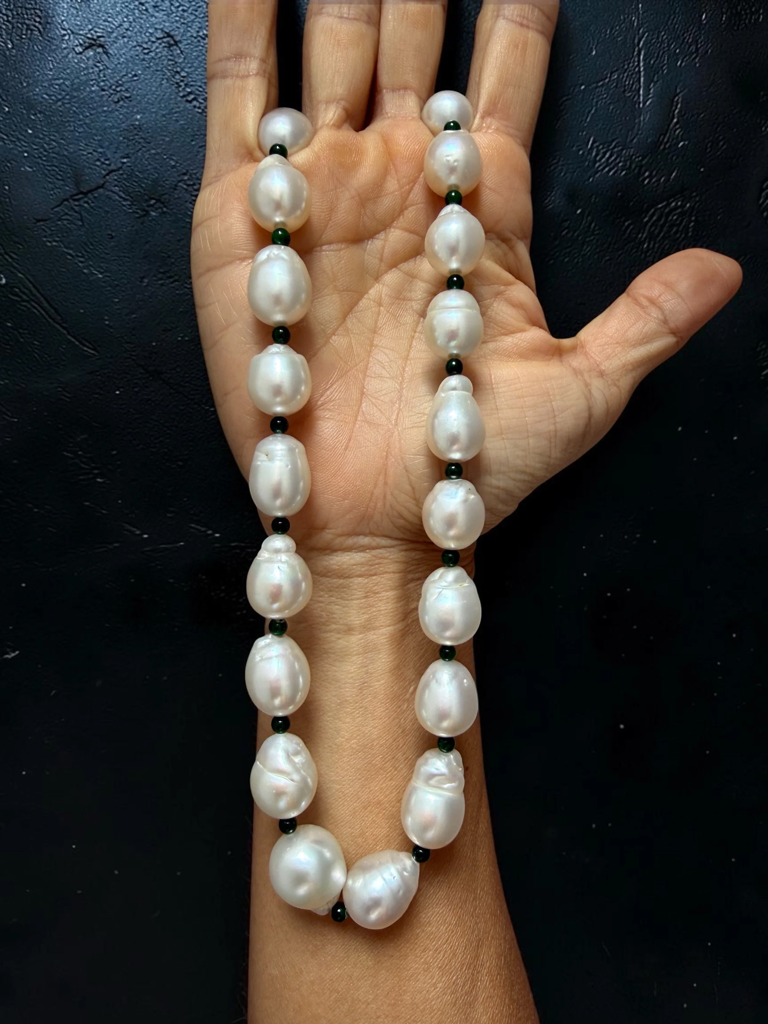 Nothing small about this baroque south sea pearl with jade beads necklace. The lustre and smoothness married with the organic shape of the pearls makes it so beautiful and mesmerising. Not one single pearl is the same - each one is so unique, yet tog
