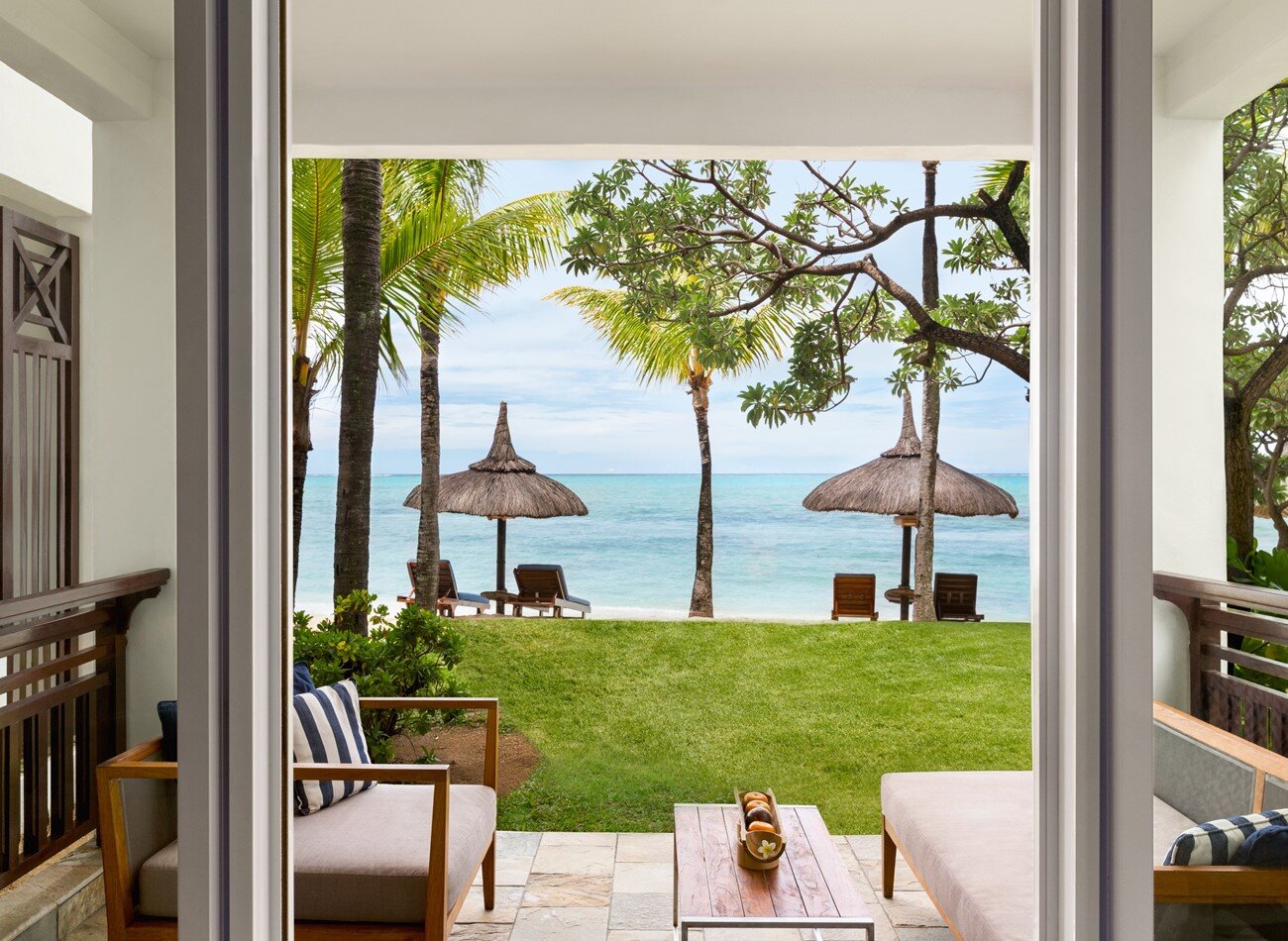 3. Junior Suite Frangipani Club Beach Access - Terrace.JPG