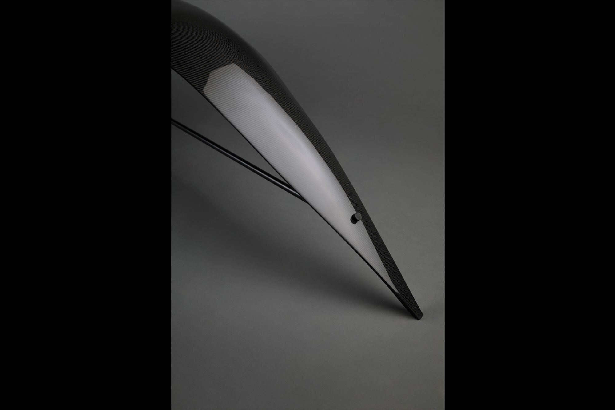 Ant-Bench-Website5-madheke-carbon fibre-versatility-strength-curved-sleek.jpg