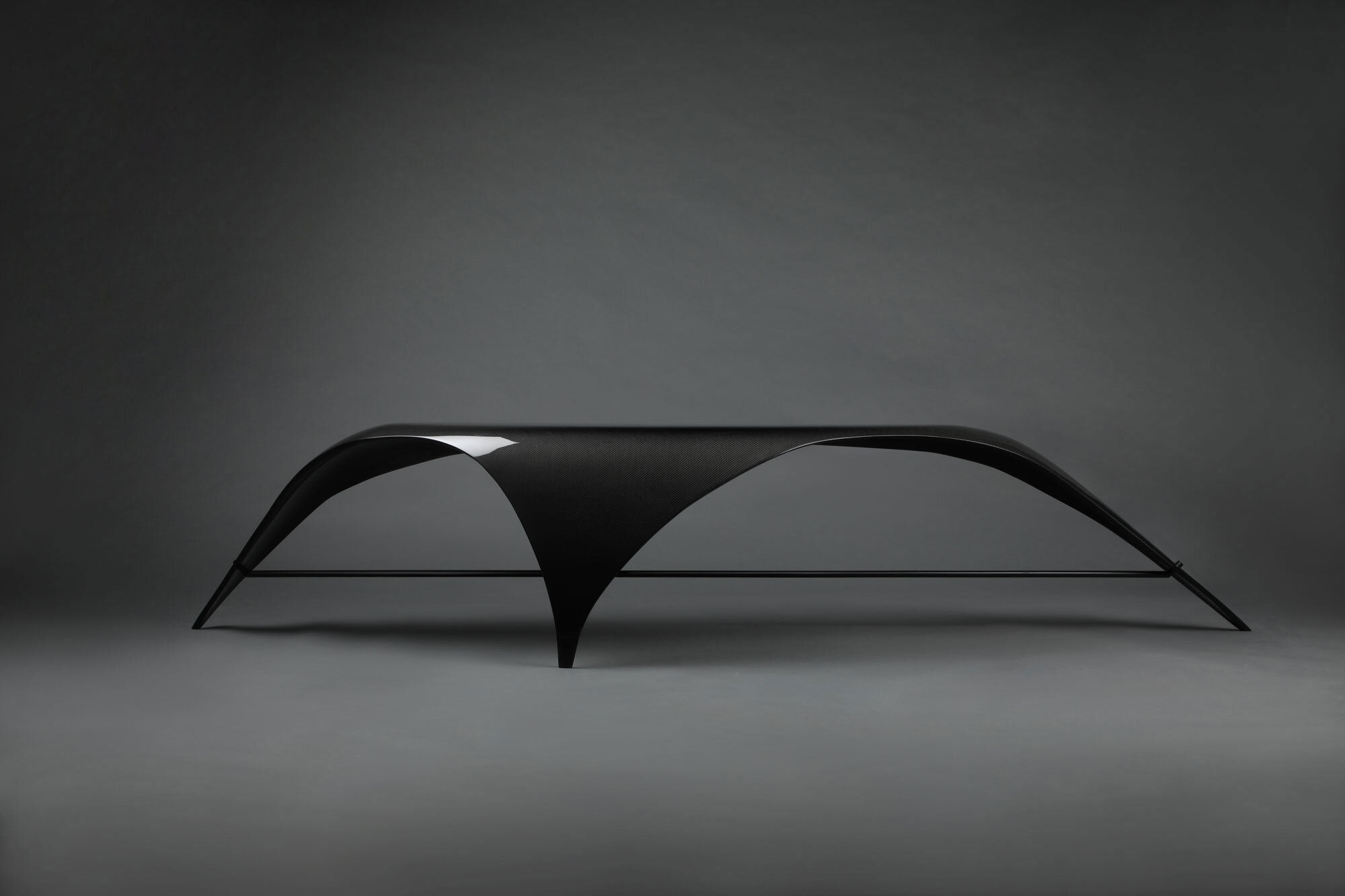 Ant-Bench-Website5-madheke-carbon fibre-versatility-strength-curved-sleek.jpg