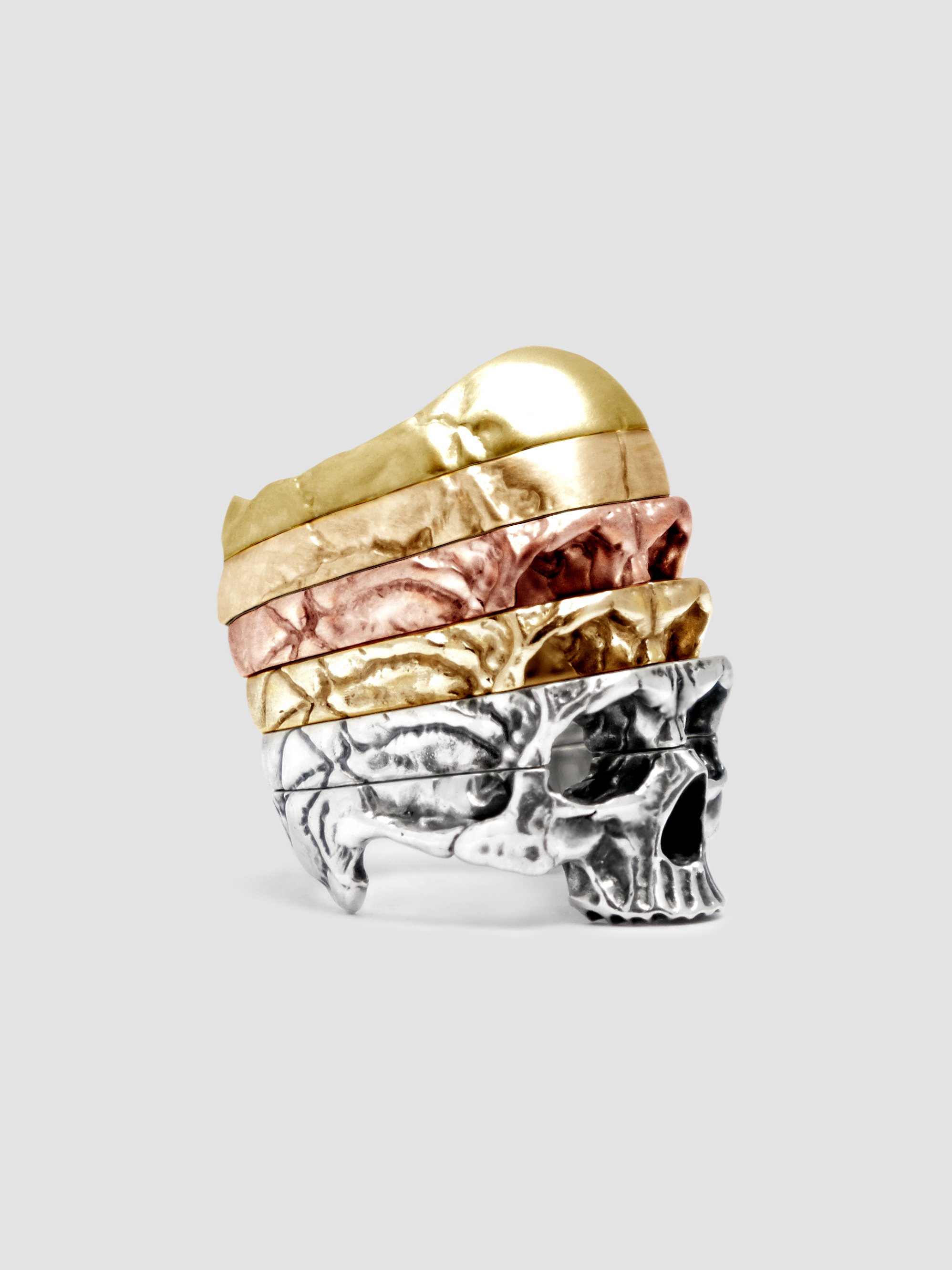 Mixed metal repeated stack.
Bottom to top; sterling silver/classic finish, sterling silver/classic finish, 9ct yellow gold/phantom finish, 9ct rose gold/phantom finish, 9ct yellow gold/satin finish, 18ct yellow gold/satin finish.