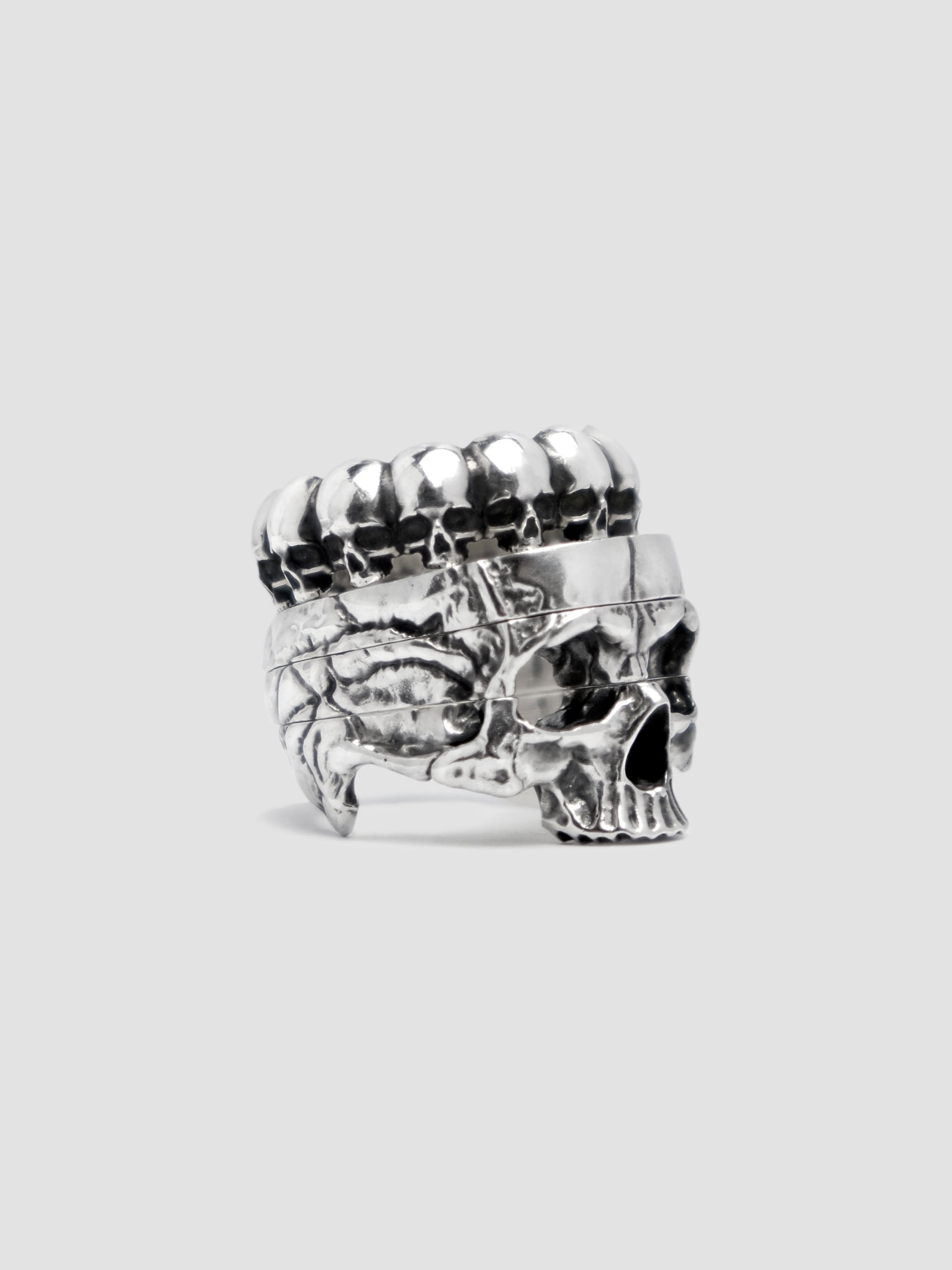 Crowning stack featuring Skull Bouquet.
Sterling silver/classic finish.